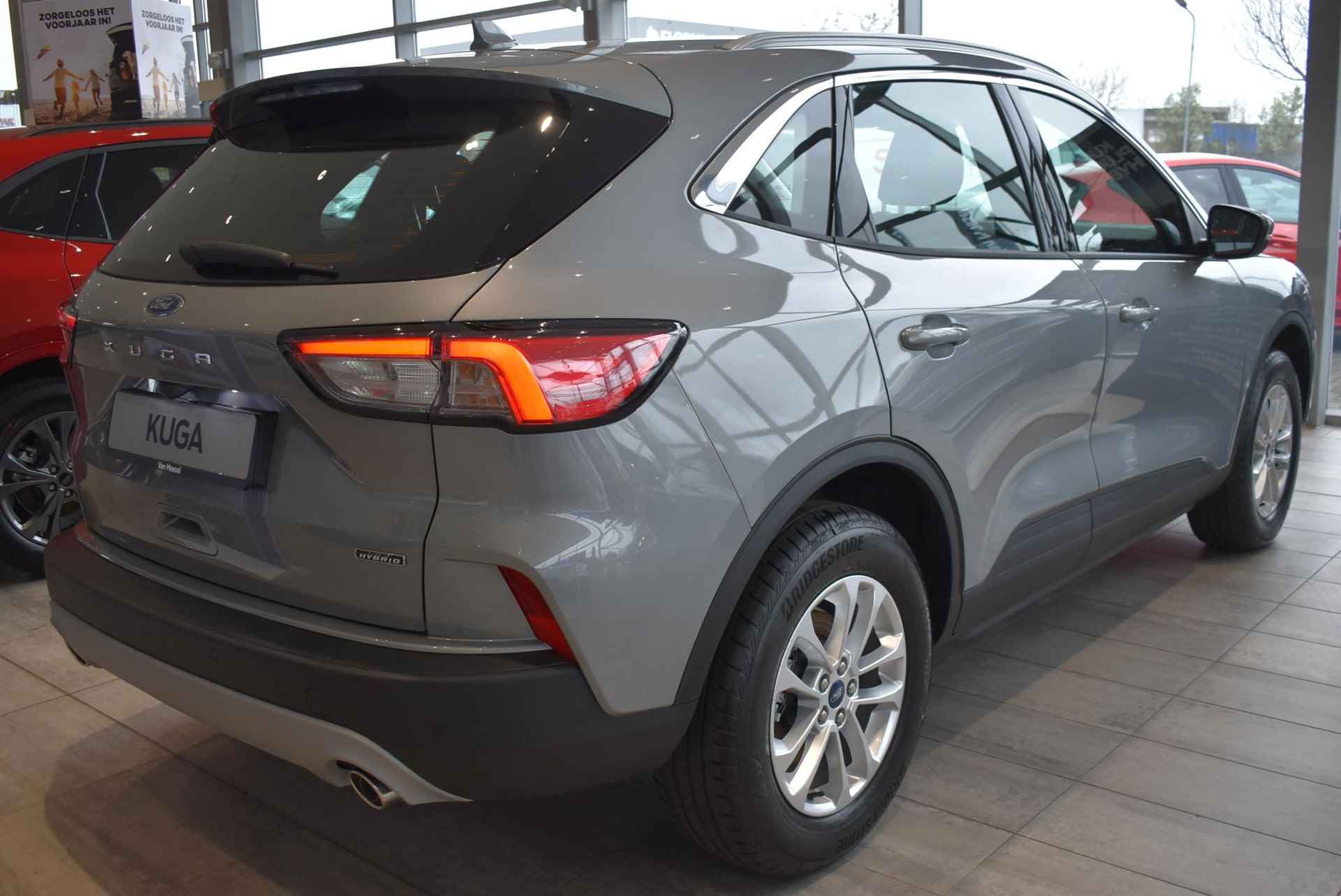 Ford Kuga 2.5 PHEV Titanium | € 6.700,- KORTING | Solar Silver | Winter Pack | 5 jaar Fabrieksgarantie | DIRECT LEVERBAAR - 9/11