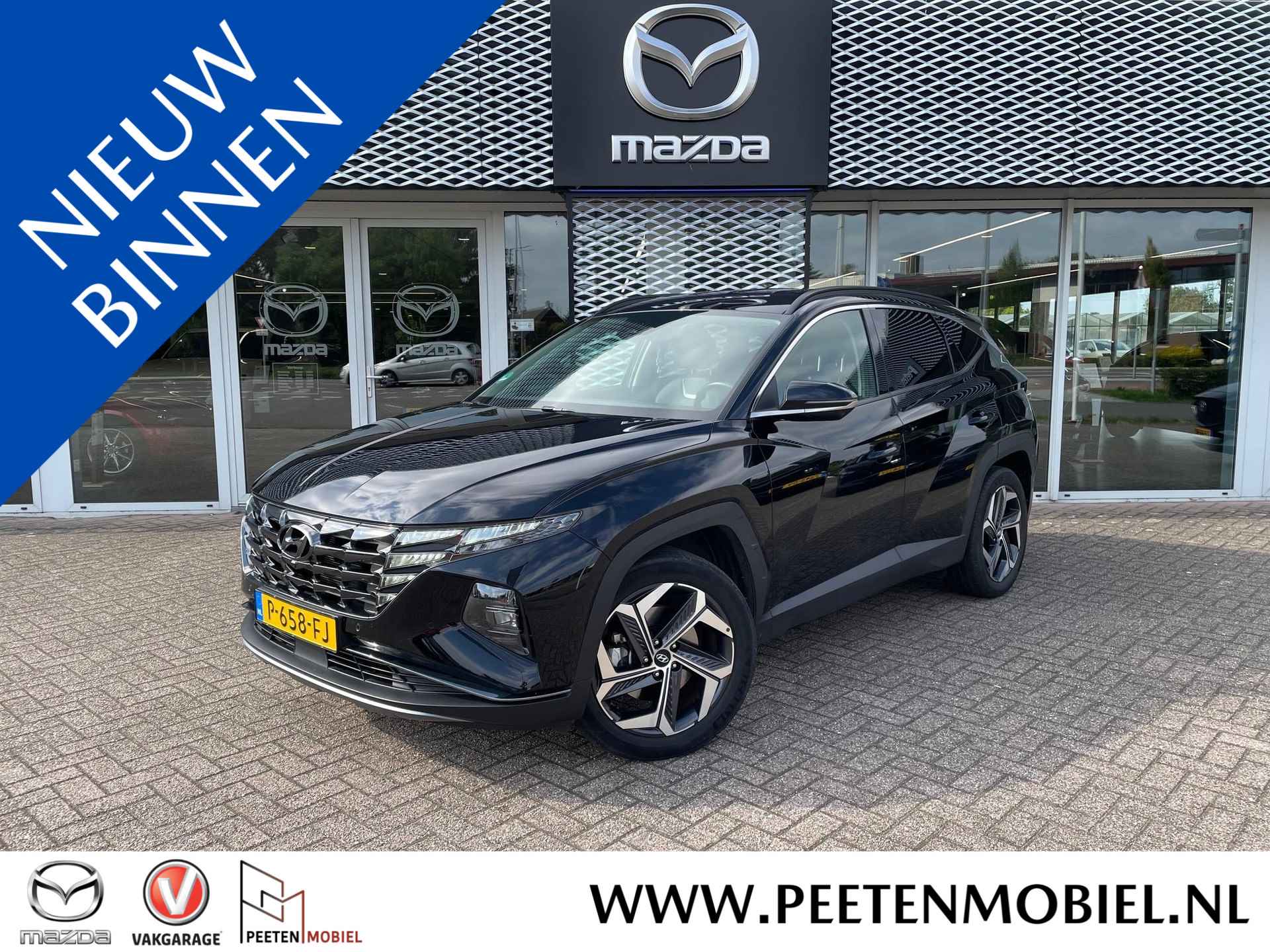 Hyundai Tucson 1.6 T-GDI HEV Premium AUTOMAAT | TREKHAAK AFNEEMBAAR | NL AUTO | - 1/6