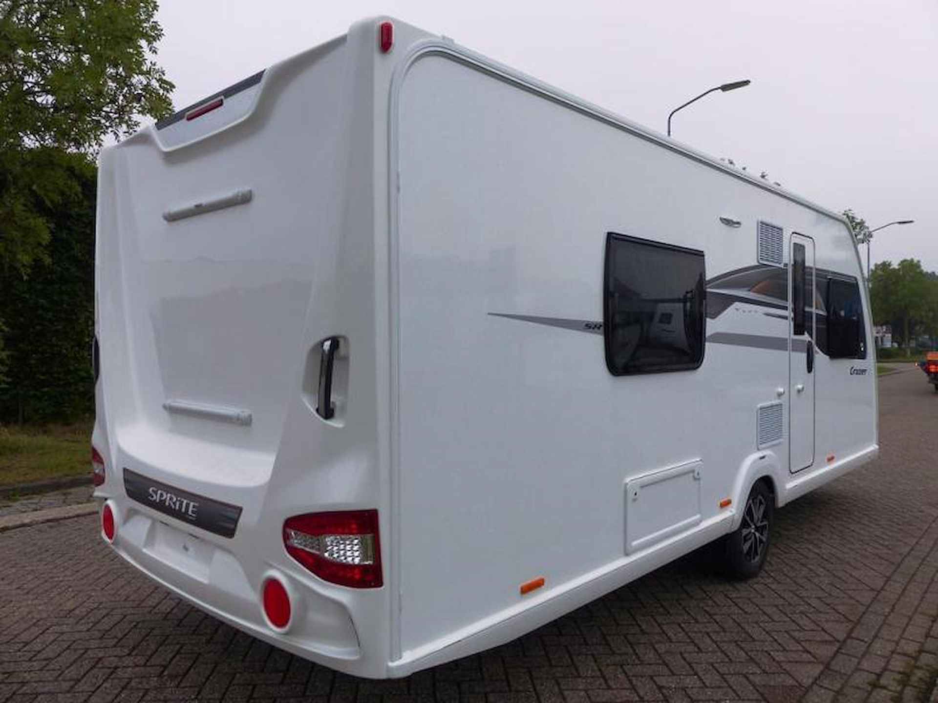 Sprite Cruzer 530 SR met aparte bedden - 4/16