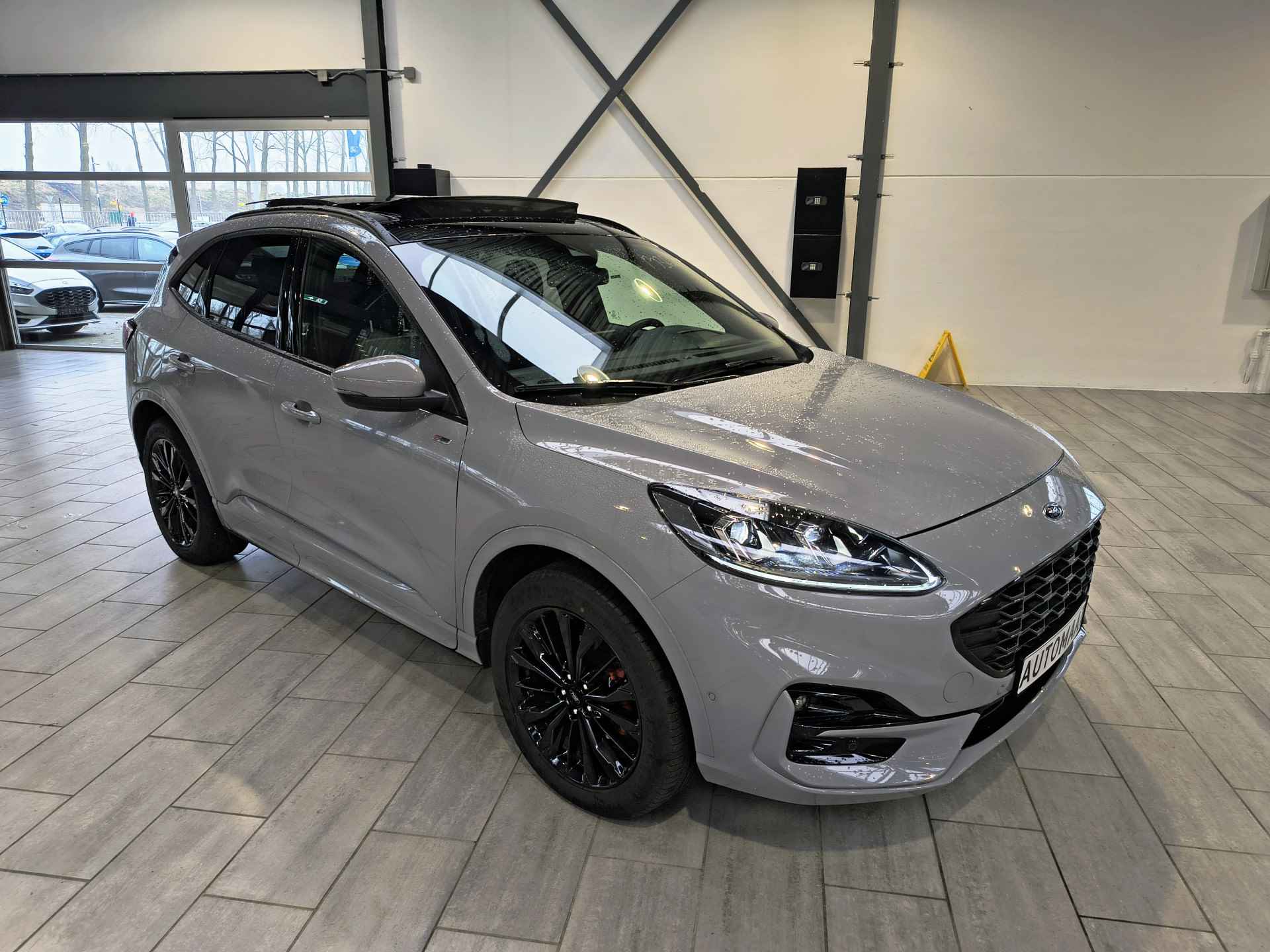 Ford Kuga 2.5 PHEV 225pk Graphite Tech I Pano | Trekhaak | Adapt Cruise | Winter Pack I 2 Camera's | Adapt. LED | fabr. gar. tm 02-2028 - 2/18