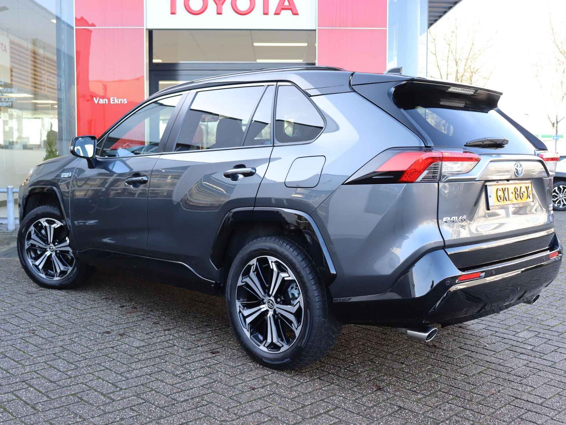 Toyota RAV4 2.5 Plug-in Hybrid AWD Bi-Tone Plus, Pano, T-Haak - 4/50