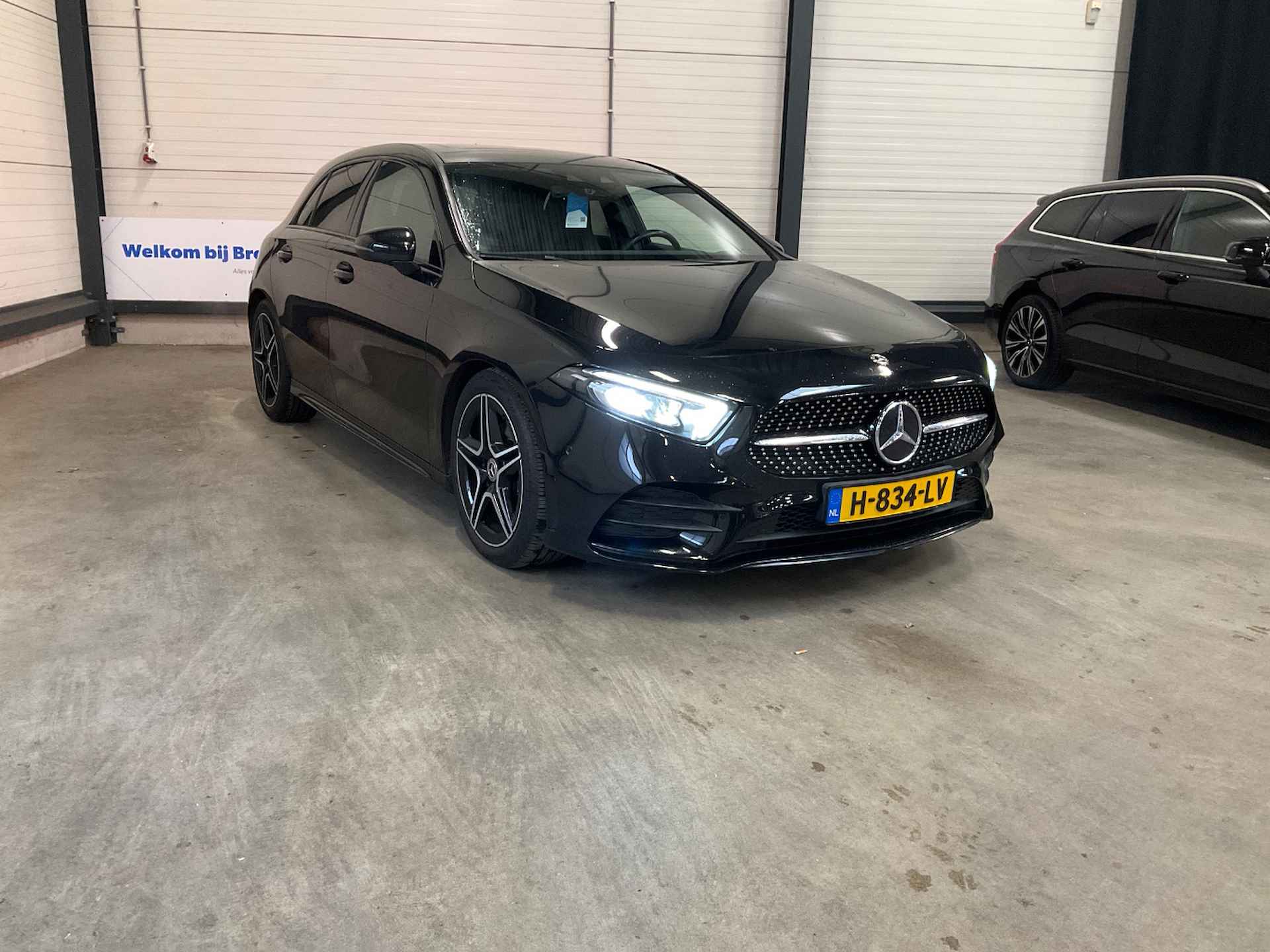 Mercedes-Benz A-Klasse 180 Business Solution AMG | Panoramadak | Stoelvermaring | Cruise Control - 5/6