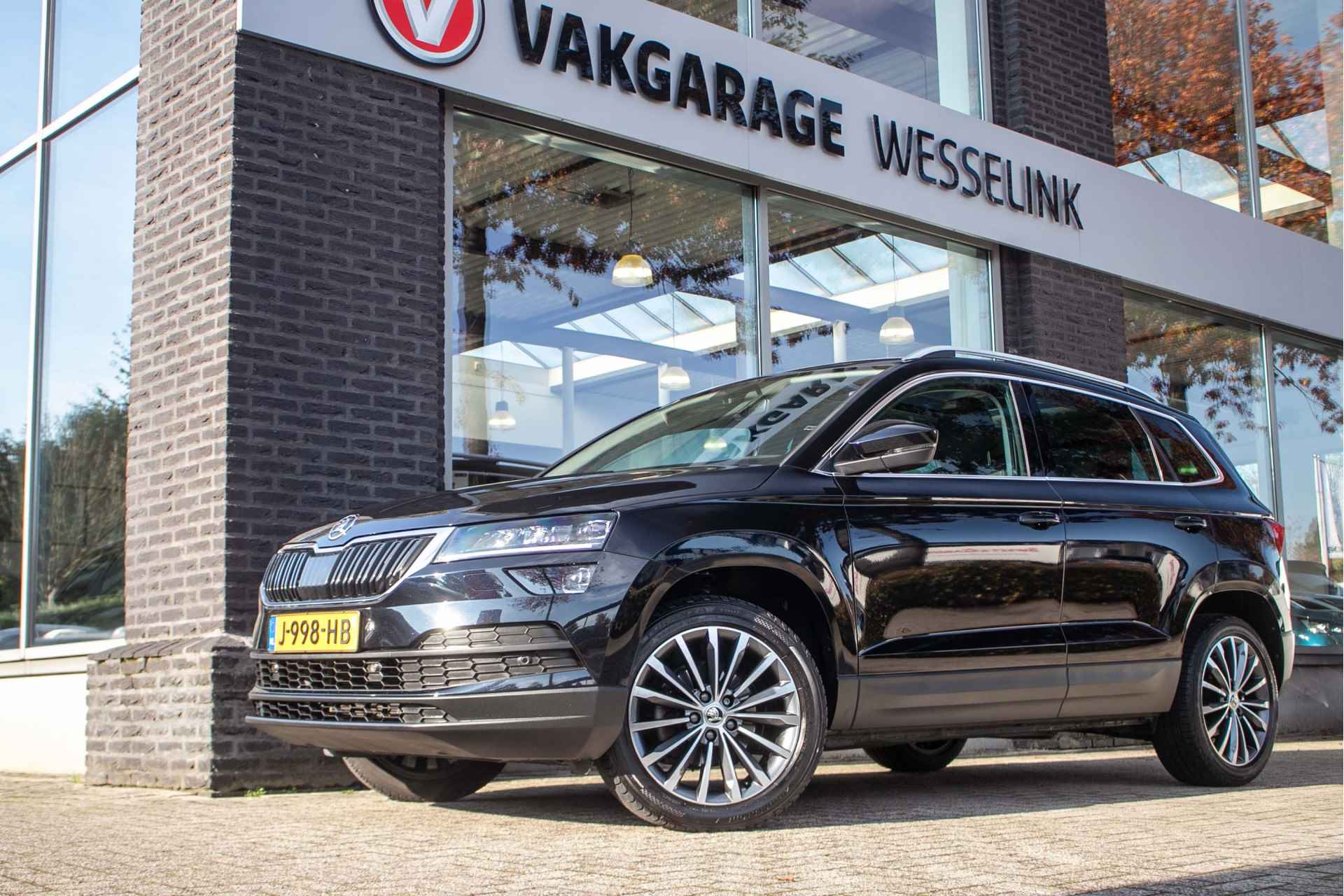 Škoda Karoq 1.5 TSI ACT Business Edition - All-in rijklrprs | Trekhaak | Panodak | Navi | Canton audio - 14/48