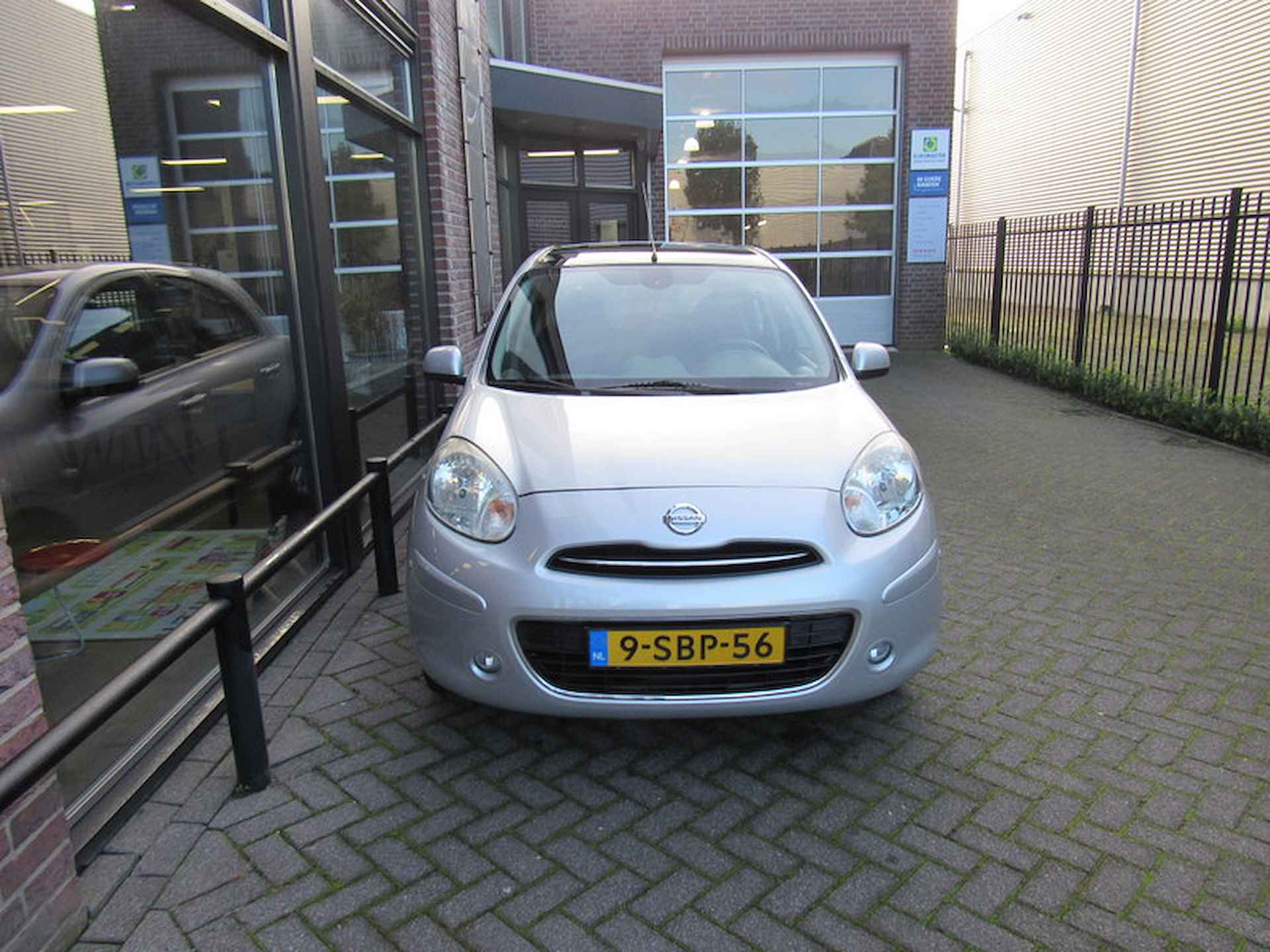 Nissan Micra 1.2 80pk Tekna glazen dak,airco, navigatie, cruise control, parkeersensoren, sportvelgen - 7/30