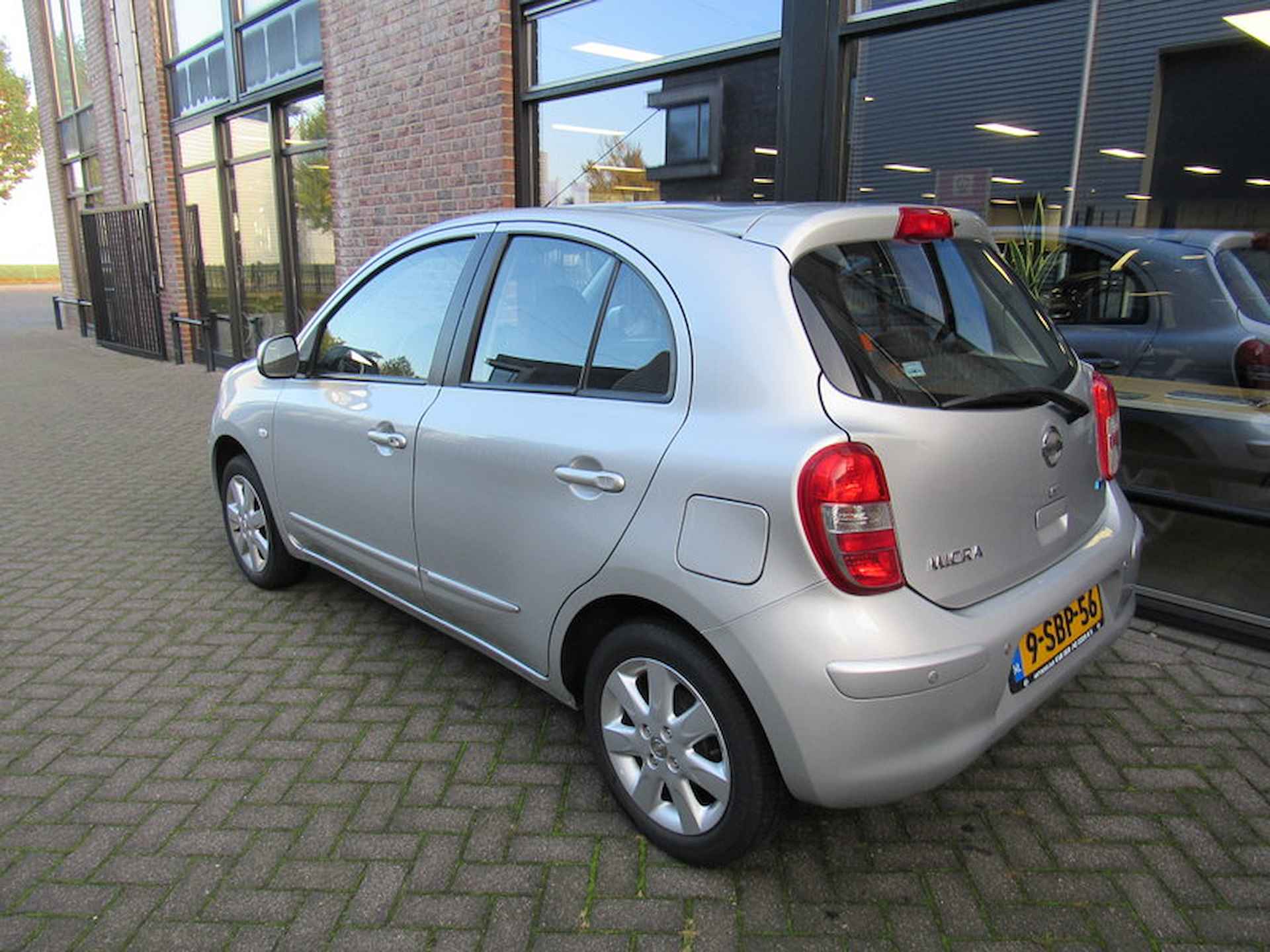 Nissan Micra 1.2 80pk Tekna glazen dak,airco, navigatie, cruise control, parkeersensoren, sportvelgen - 10/30