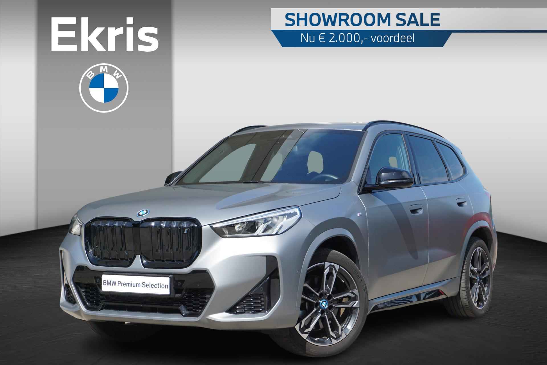 BMW iX1 xDrive30 Launch Edition M Sportpakket / 19" LMV / Achteruitrijcamera / Stoelverwarming / Harman Kardon | Showroom Sale - 1/35