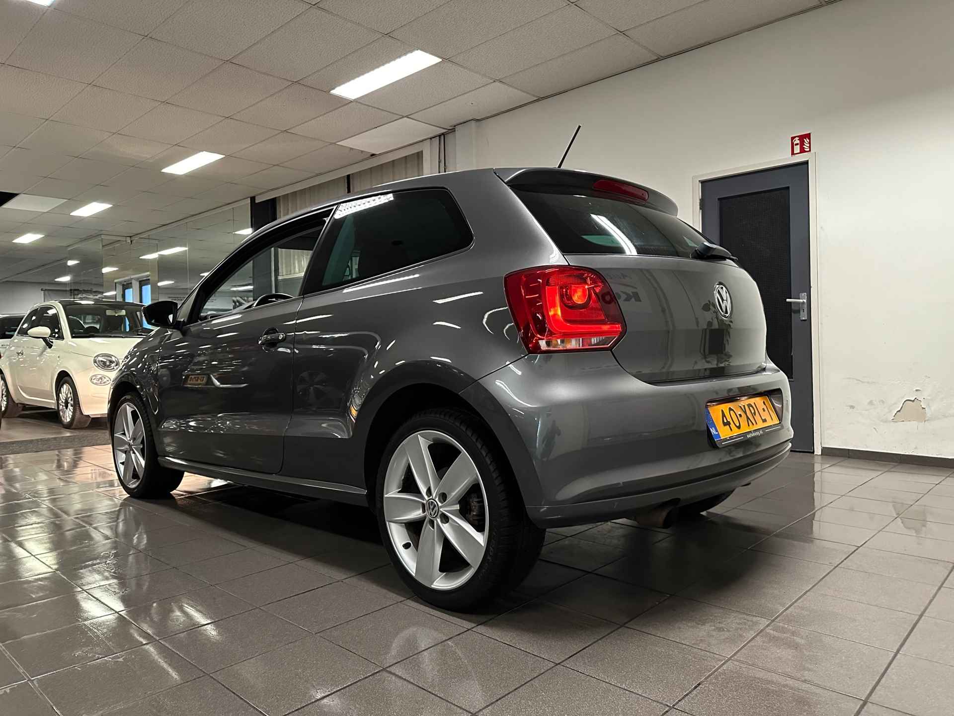 Volkswagen Polo 1.2 TSI Highline * Automaat / Navigatie / 17" LM Velgen / NL Auto * - 3/23