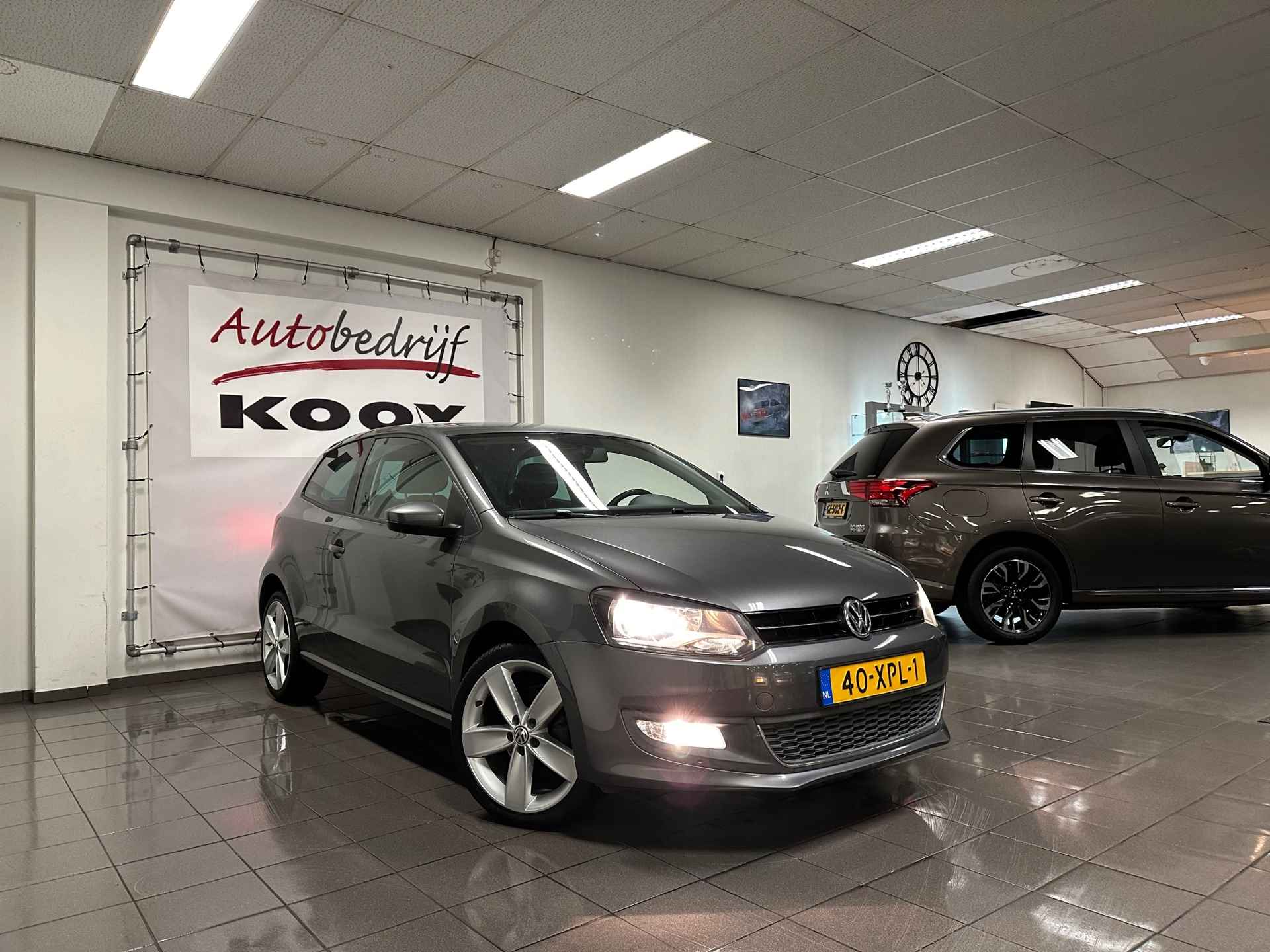 Volkswagen Polo 1.2 TSI Highline * Automaat / Navigatie / 17" LM Velgen / NL Auto * - 7/23