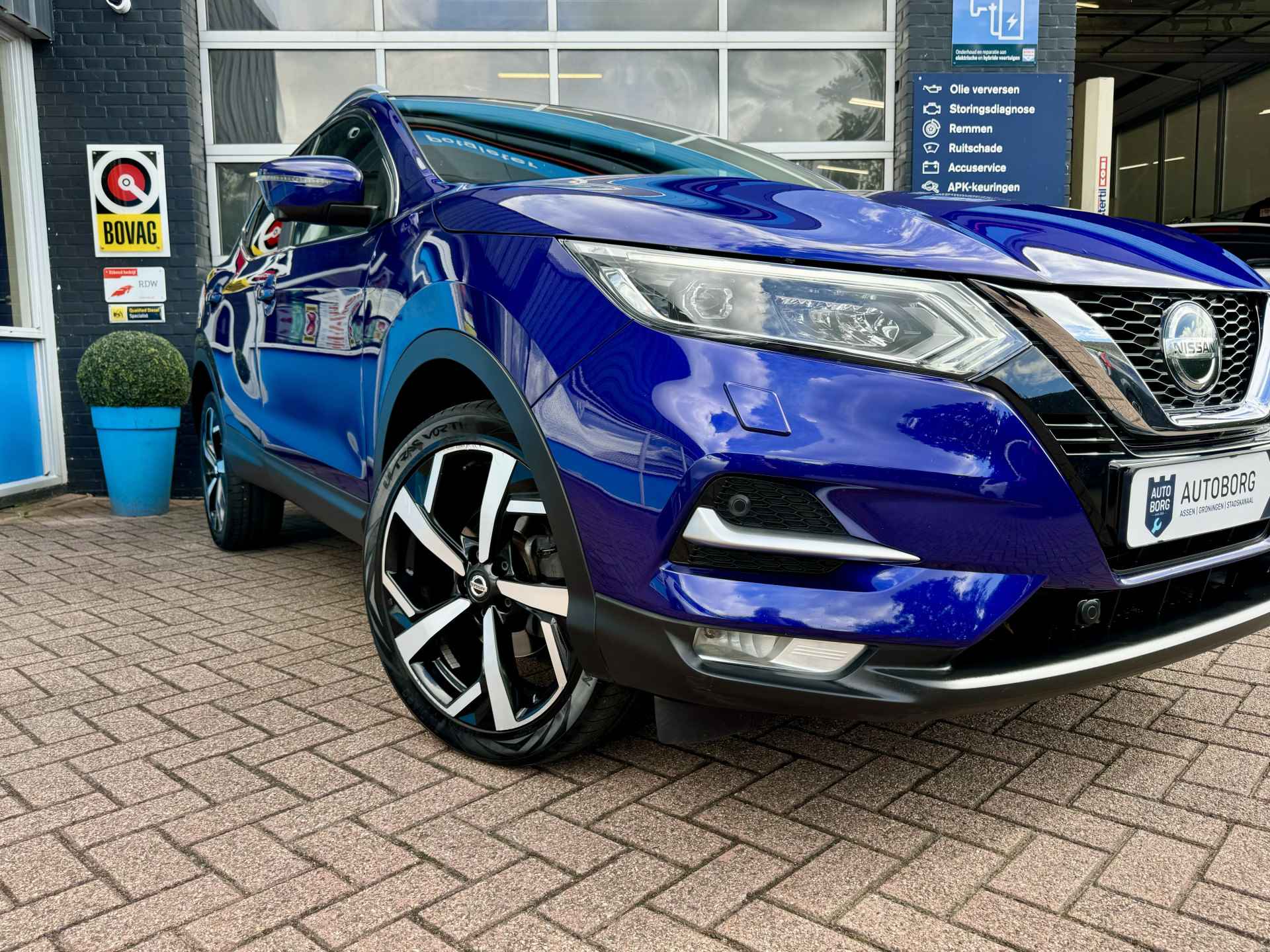 Nissan QASHQAI 1.3 DIG-T Design Edition | 360 Camera | Apple Carplay | Uitparkeer waarschuwing | Navi | Keyless entry | Dodehoek detector | Autonomous Emergency Braking | Rijklaar + 12 maanden Bovag garantie - 34/39