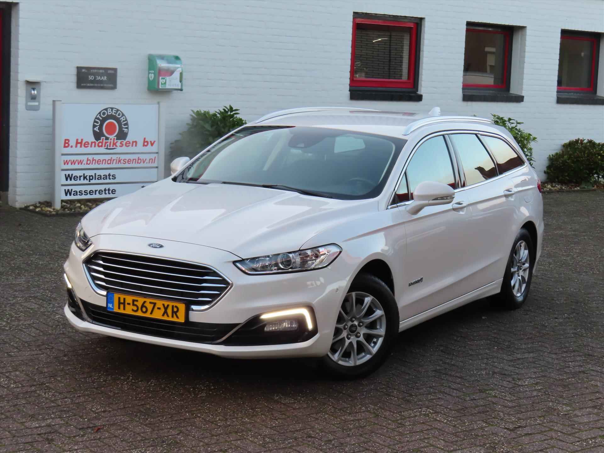 Ford Mondeo Wagon 2.0 HEV 187pk eCVT Titanium/ Parelmoer wit/ Adaptieve cruise/ Keyless entry/ Camera achter/ Navi/ DAB/ Apple Carplay/ 1 Eigenaar/ Origineel NL/ NAP - 38/42