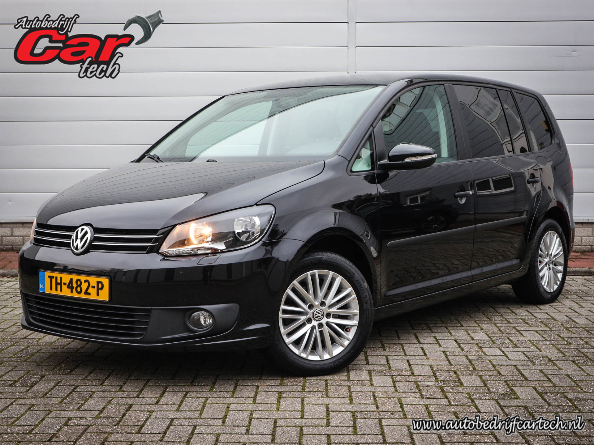 Volkswagen Touran 1.6 TDI Comfortline BlueMotion 7p. | Airco | Navi | Cruise | Lichtmetaal | 7 Persoons | Mistlampen | Trekhaak |