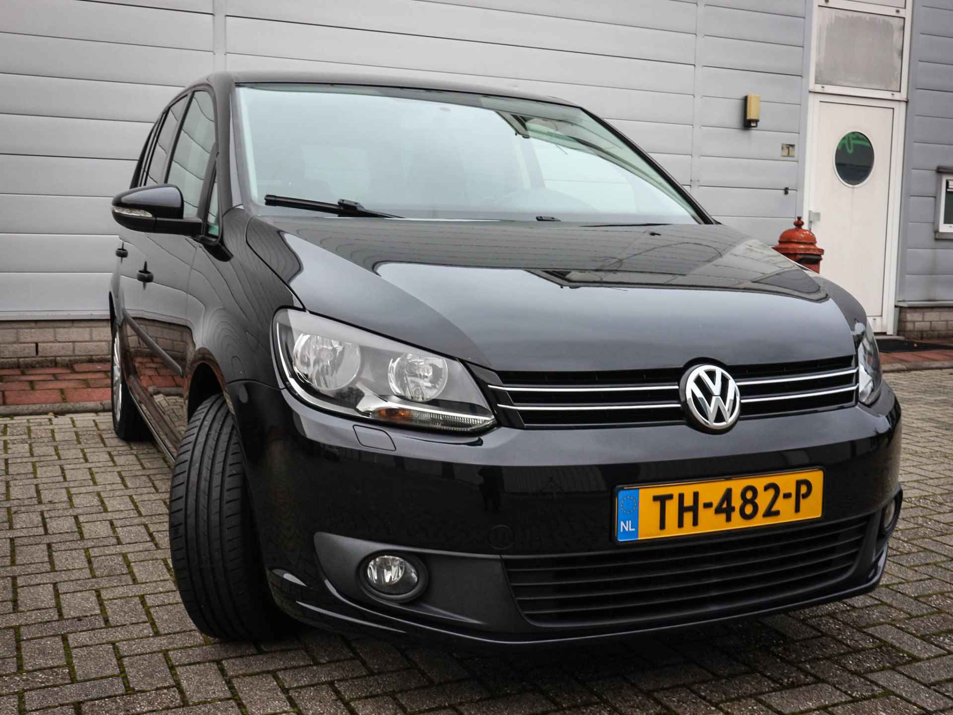 Volkswagen Touran 1.6 TDI Comfortline BlueMotion 7p. | Airco | Navi | Cruise | Lichtmetaal | 7 Persoons | Mistlampen | Trekhaak | - 25/48