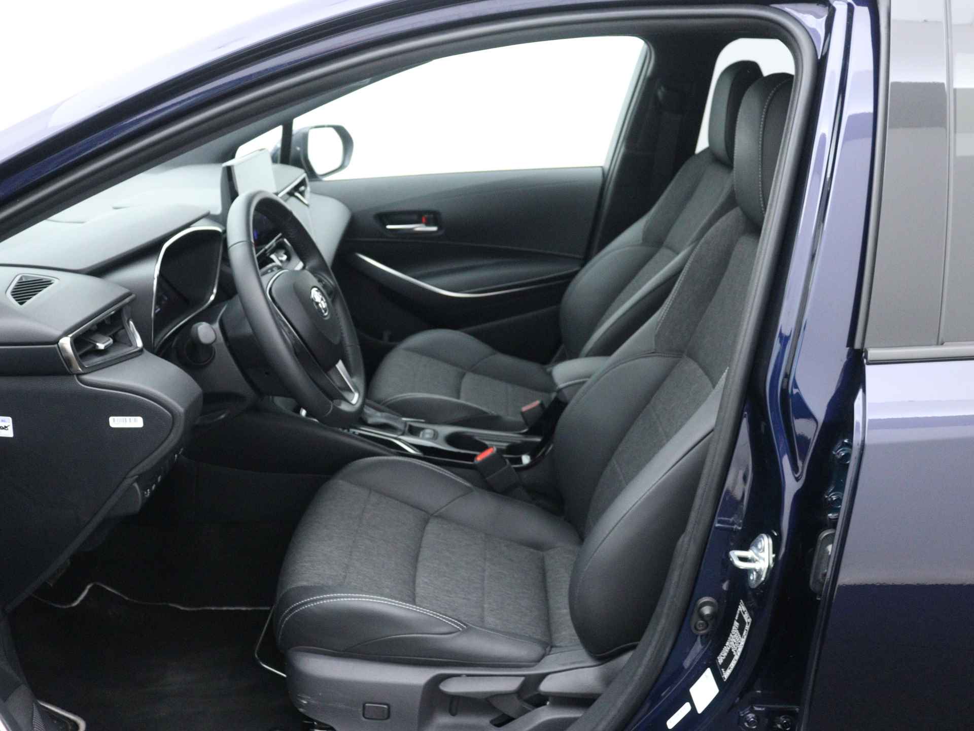 Toyota Corolla Touring Sports 1.8 Hybrid First Edition | Stoelverwarming | Parkeersensoren | Navigatie | Elektrisch bedienbare achterklep | - 20/45