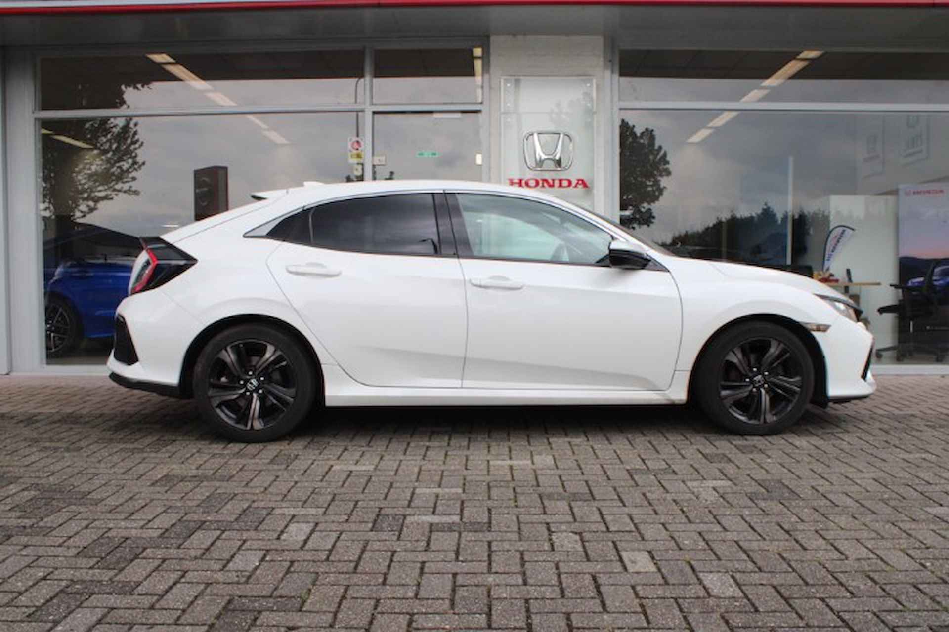 HONDA Civic 1.0 i-VTEC 129pk Elegance | Navigatie & Carplay | Adaptieve Cruisecontrol | Parkeersensoren | Stoelverwarming | Stoelverwarming | - 3/45