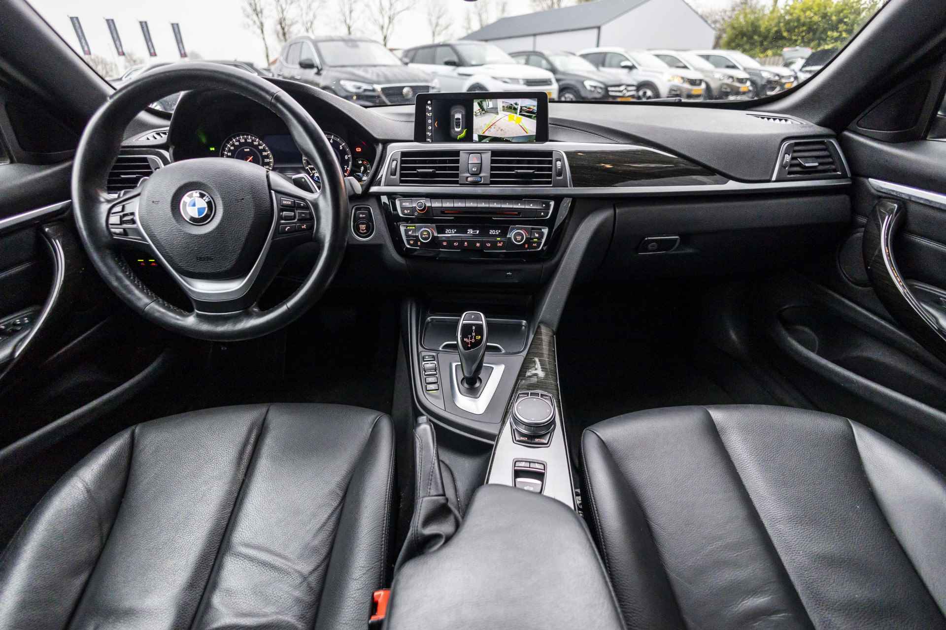 BMW 4 Serie Cabrio 420i High Executive Edition | Stoel- en nekverwarming | Camera | NL Auto - 37/44