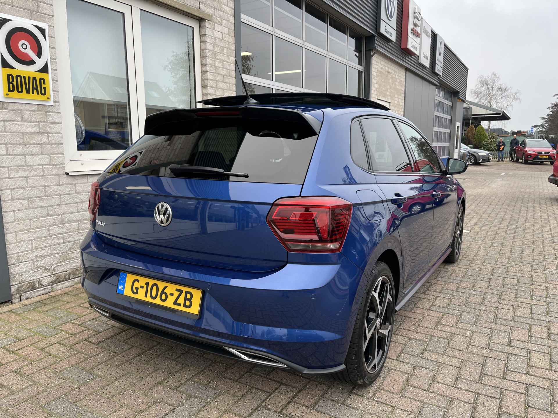 Volkswagen Polo 1.0 TSI R-Line / AUTOMAAT/ PANO/ DIGITAL DASH/ NAVI/ CRUISE/ DAB/ PARK. SENSOREN/ 17"LMV - 38/42