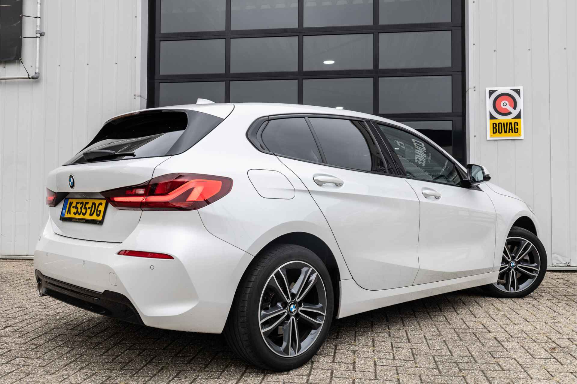 BMW 1-serie 118i Sportline Executive Edition ✅Navipro✅Parelmoer✅BTW - 4/17