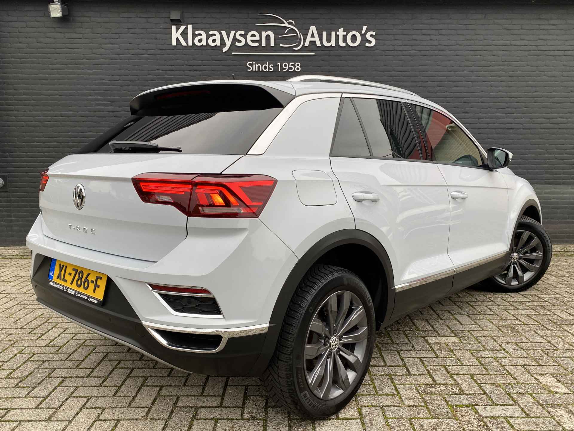 Volkswagen T-Roc 1.5 TSI Sport | 1e eigenaar | dealer onderhouden | panoramadak | apple carplay | wit metallic | digitale cockpit - 6/44