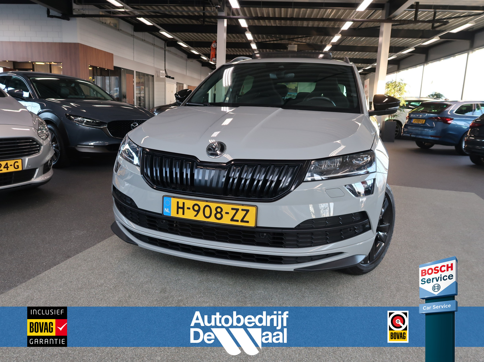 Škoda Karoq 1.5 TSi 150pk DSG Sportline Business SCHUIFDAK/KEYLESS/VIRTUAL/CAMERA/TREKH.WEGKLAPBAAR