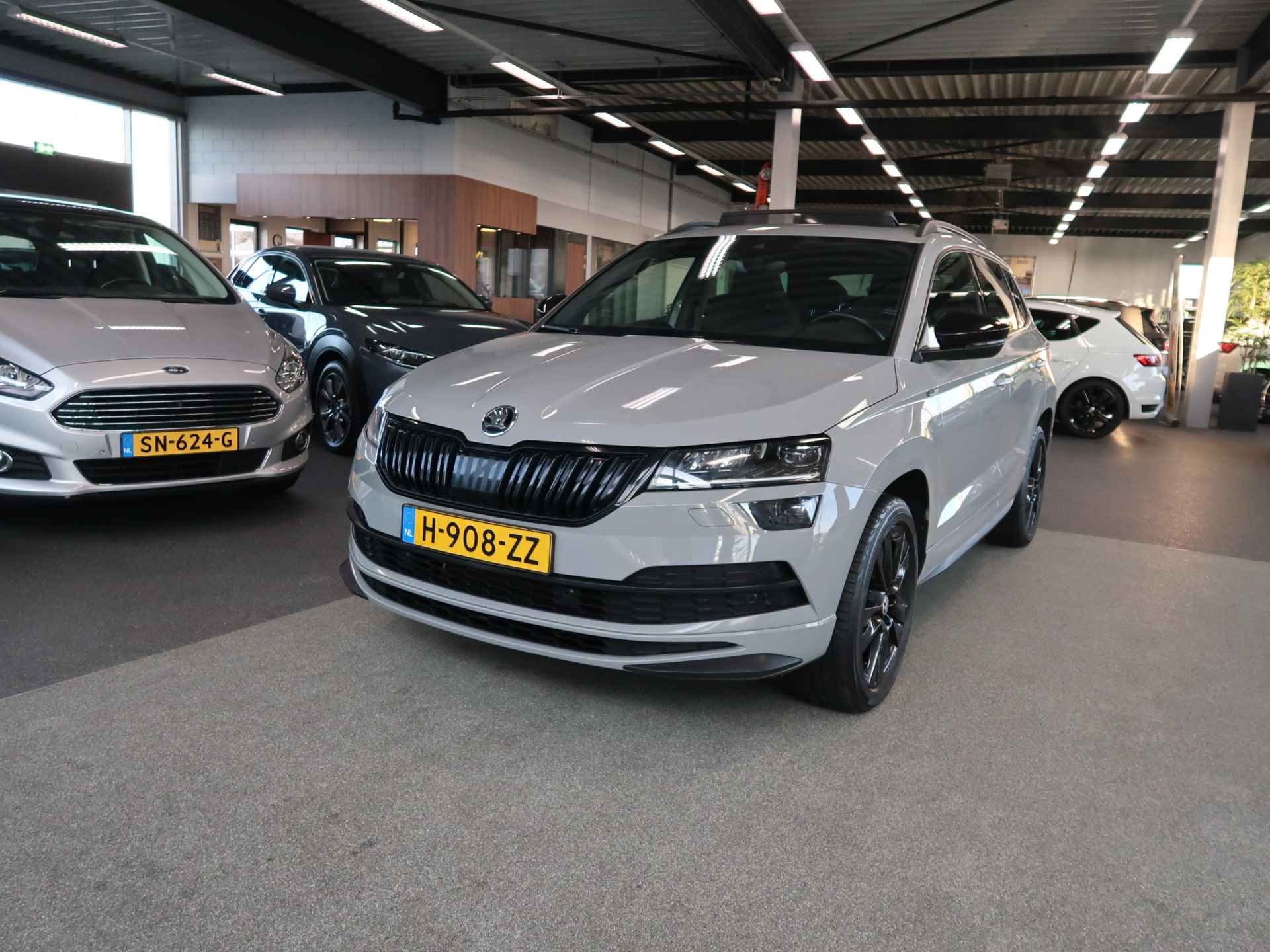 Škoda Karoq 1.5 TSi 150pk DSG Sportline Business SCHUIFDAK/KEYLESS/VIRTUAL/CAMERA/TREKH.WEGKLAPBAAR - 15/105