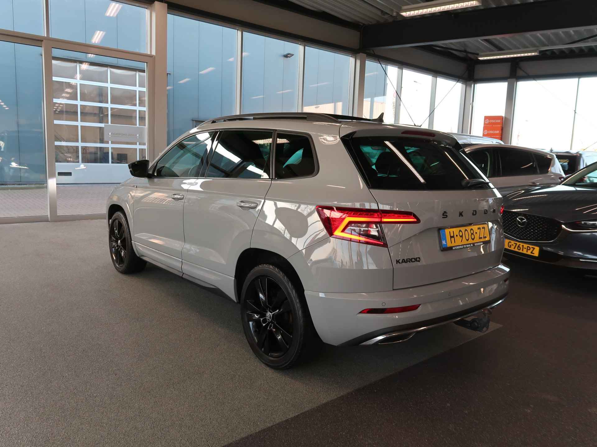 Škoda Karoq 1.5 TSi 150pk DSG Sportline Business SCHUIFDAK/KEYLESS/VIRTUAL/CAMERA/TREKH.WEGKLAPBAAR - 23/105