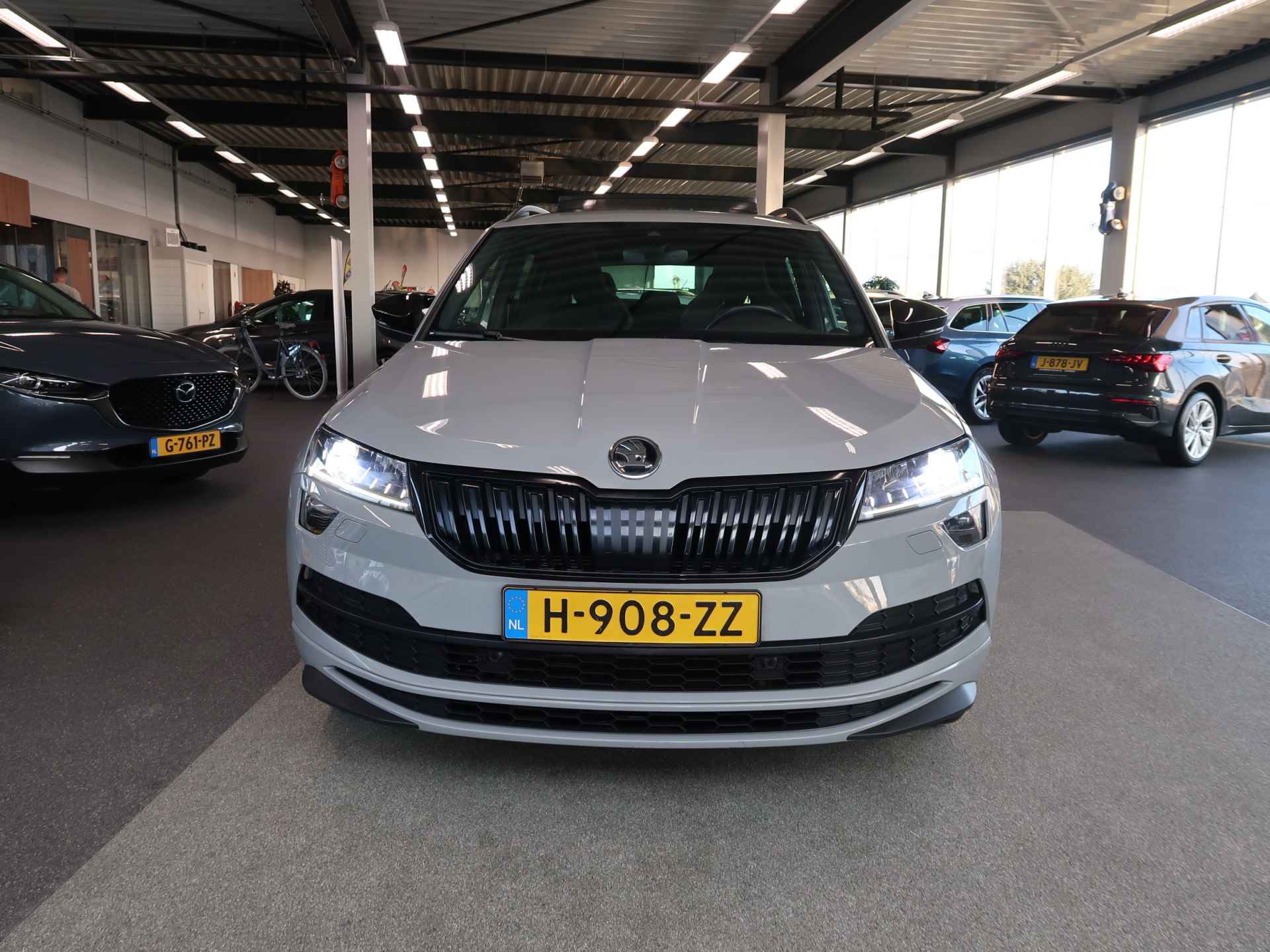 Škoda Karoq 1.5 TSi 150pk DSG Sportline Business SCHUIFDAK/KEYLESS/VIRTUAL/CAMERA/TREKH.WEGKLAPBAAR - 80/105