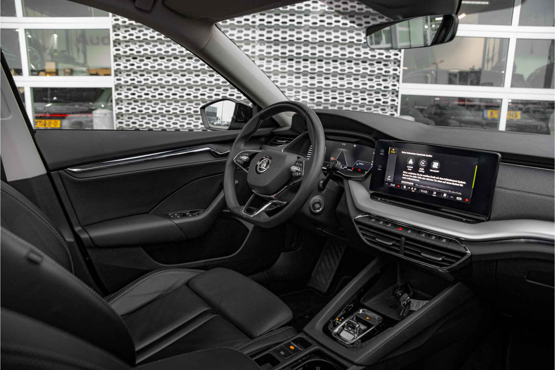 Škoda Octavia Combi 1.4 TSI iV PHEV Business Edition Plus | Panoramadak | Lederen bekleding | Trekhaak | Head-up | - 9/28