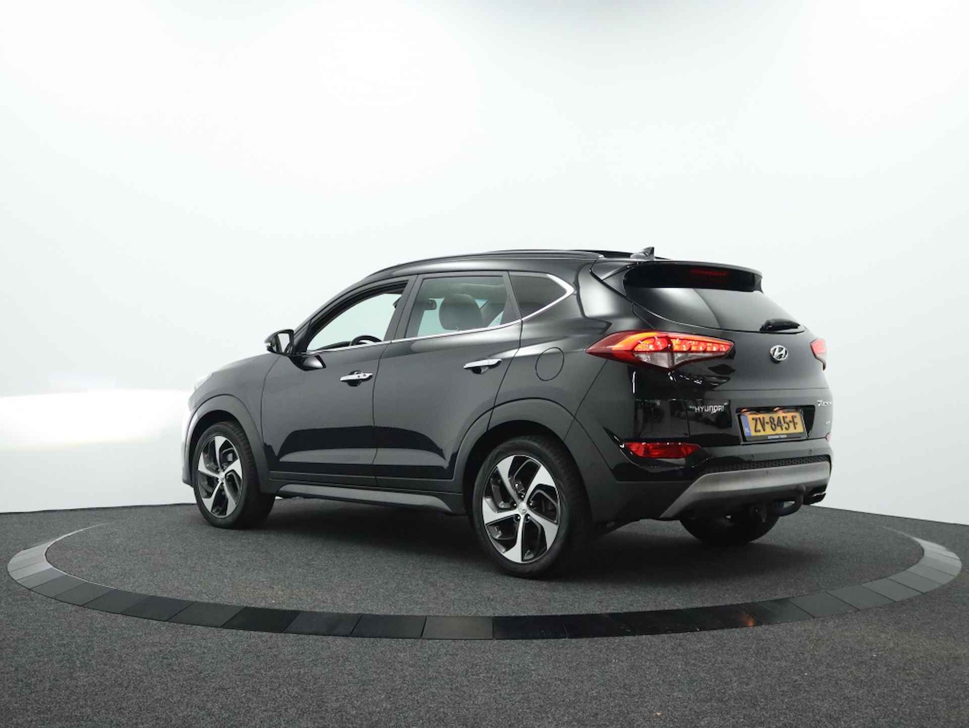 Hyundai Tucson 1.6 Premium Sky 4WD | Panoramadak | Camera | Navigatie - 2/49