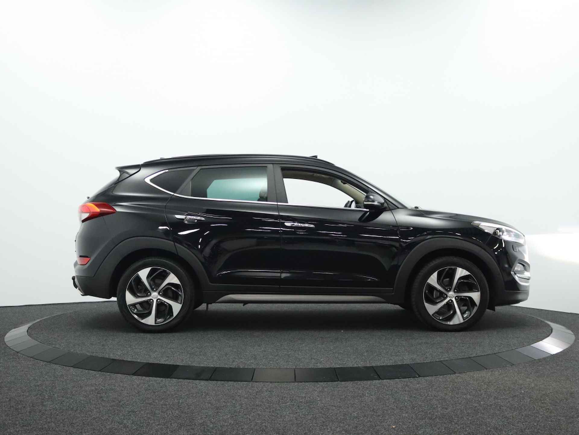 Hyundai Tucson 1.6 Premium Sky 4WD | Panoramadak | Camera | Navigatie - 8/49