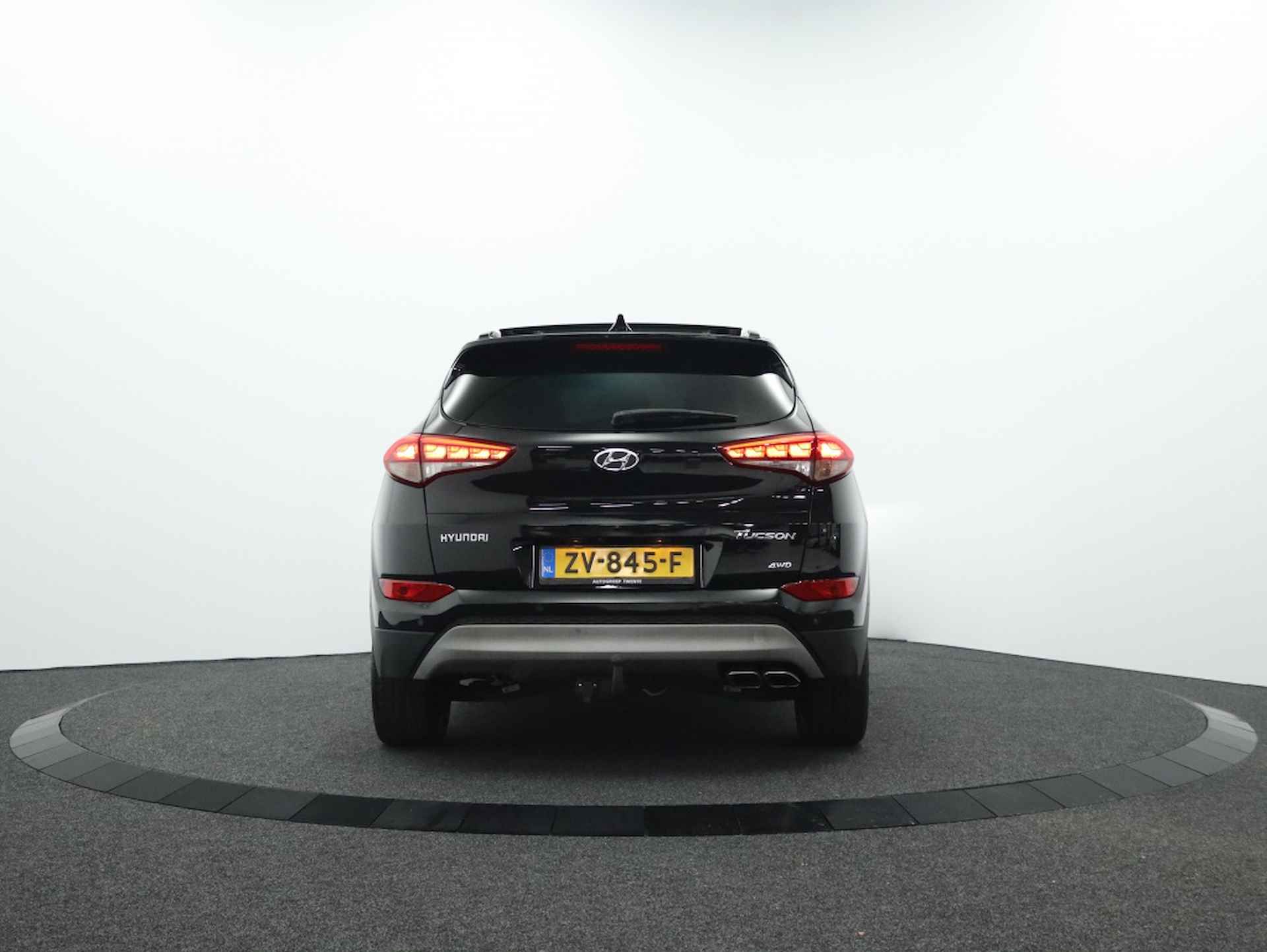 Hyundai Tucson 1.6 Premium Sky 4WD | Panoramadak | Camera | Navigatie - 11/49