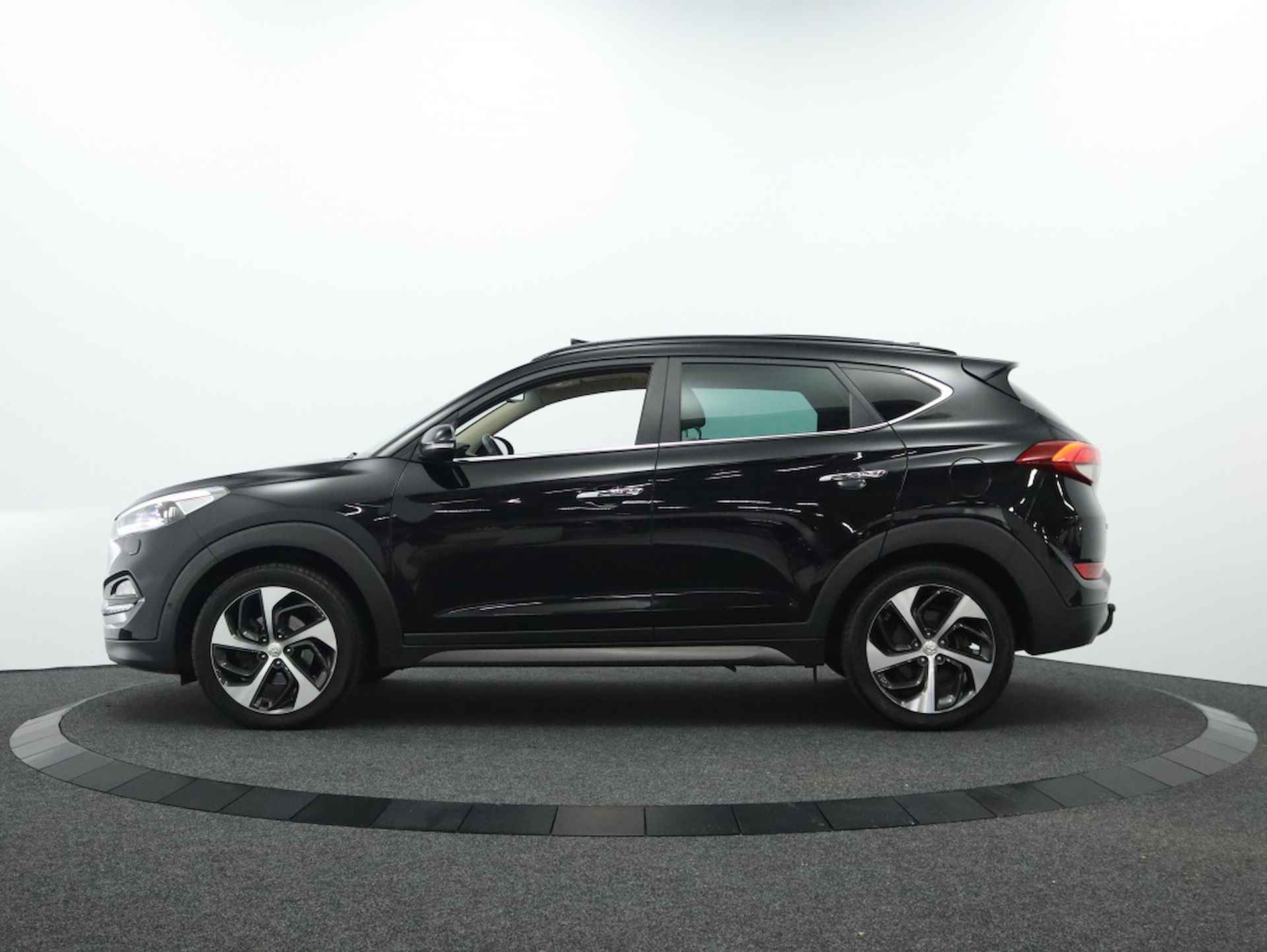 Hyundai Tucson 1.6 Premium Sky 4WD | Panoramadak | Camera | Navigatie - 17/49