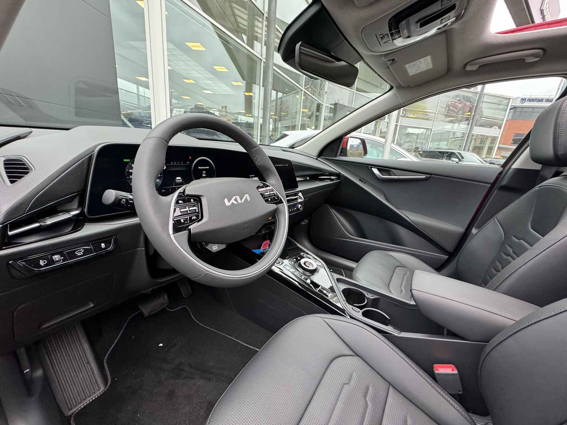 Kia Niro EV DynamicPlusLine 64.8 kWh | KM-Stand kan oplopen | Unieke velgen | Zwarte logo's | Schuif/Kanteldak | Enz... - 10/28