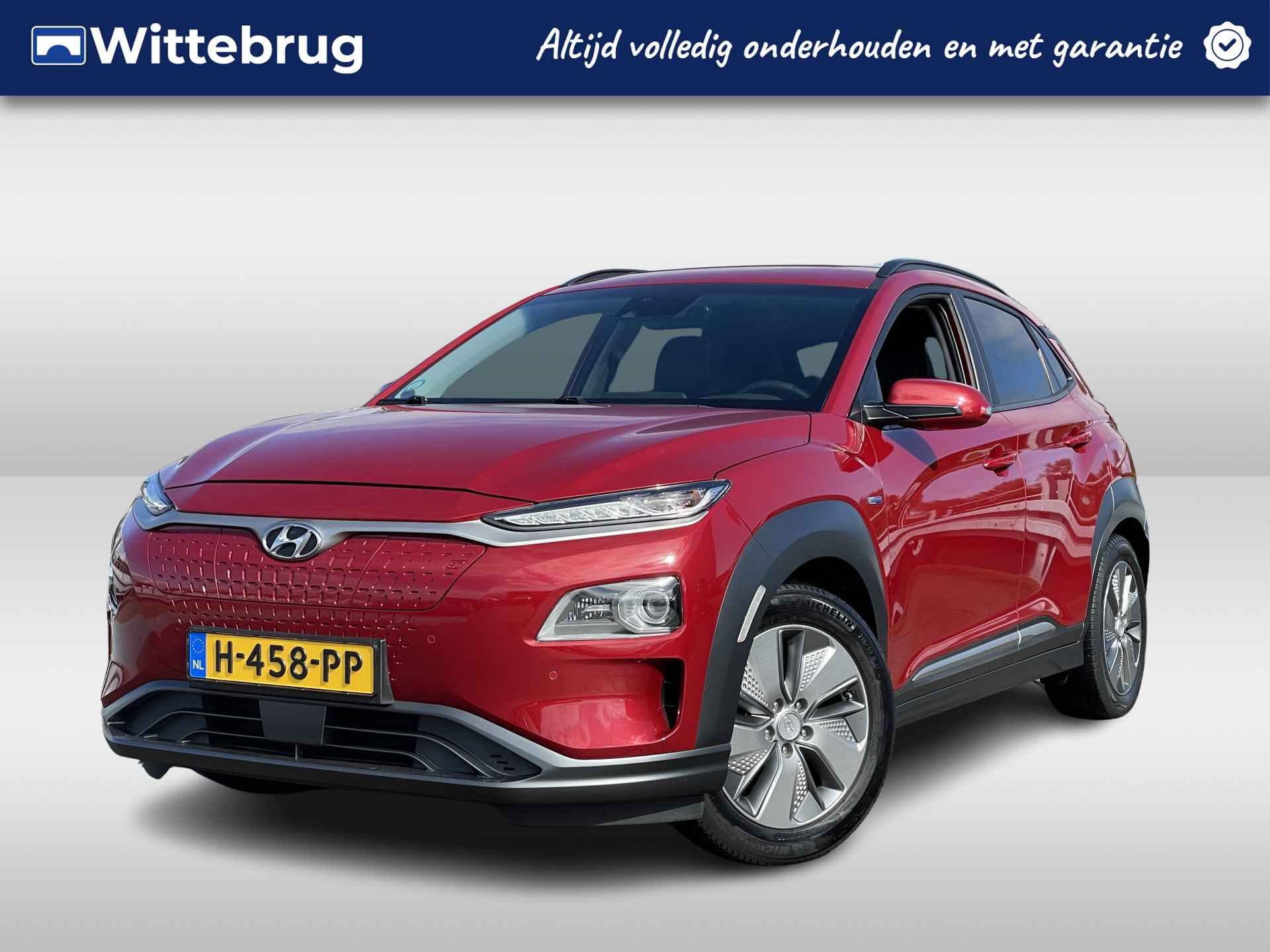 Hyundai KONA EV Premium 64 kWh | Lederen interieur | Schuif-/ kanteldak | Navigatiesysteem | Rijklaarprijs! - 1/39