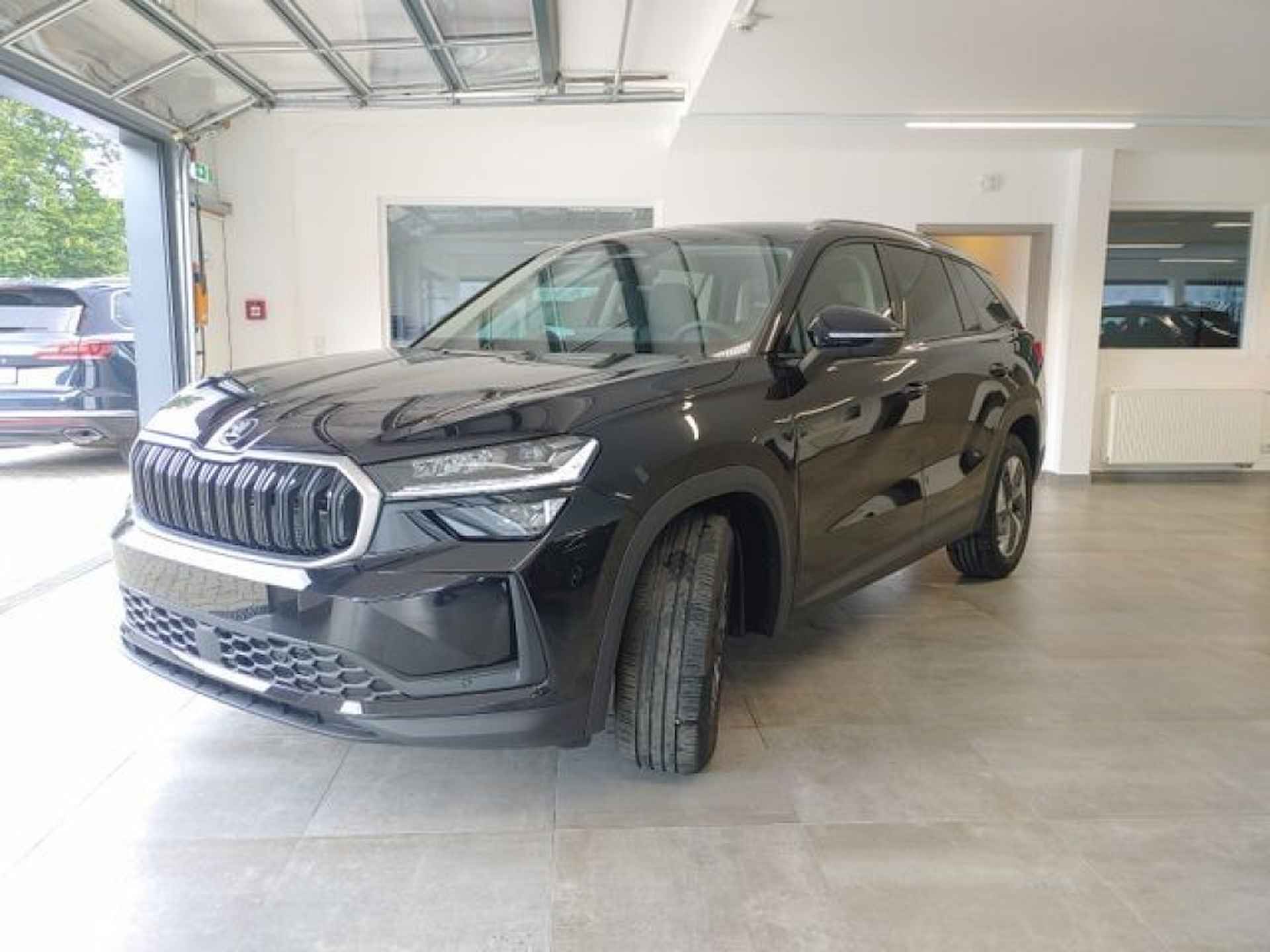 SKODA Kodiaq 2.0 TDI DSG SELECTION TREKHAAK/CARPLAY/ACC/PDC/STOELVERW - 4/17