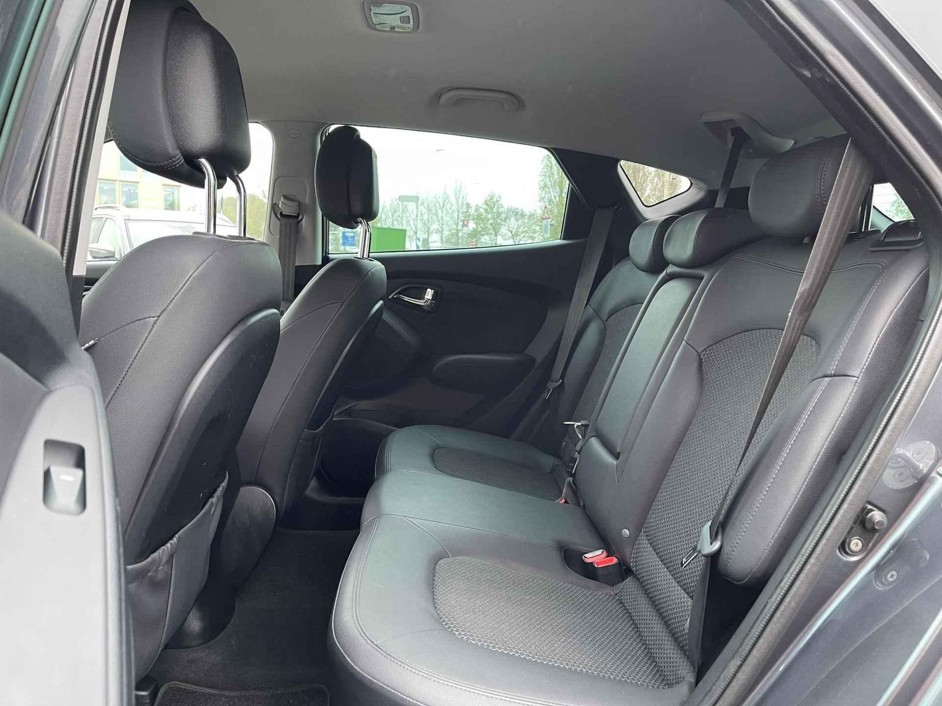 Hyundai ix35 2.0i Style | Trekhaak | Cruise Control | Radio-CD/Mp3 Speler | Bluetooth Tel. | LM Velgen | Elek. Ramen + Spiegels | Rijklaarprijs! - 12/26