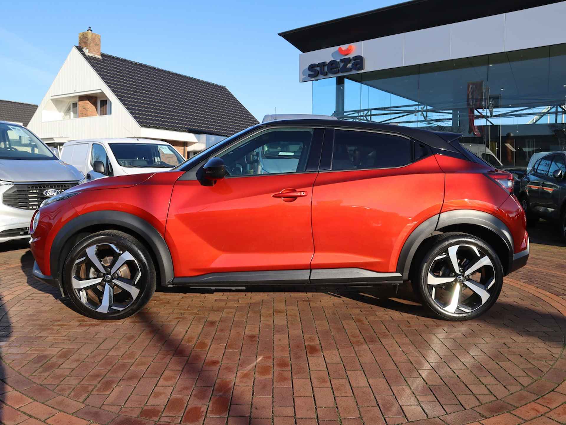 Nissan Juke 1.0 DIG-T Premiere Edition / Navigatie / Camera / Stoelverwarmin - 5/32