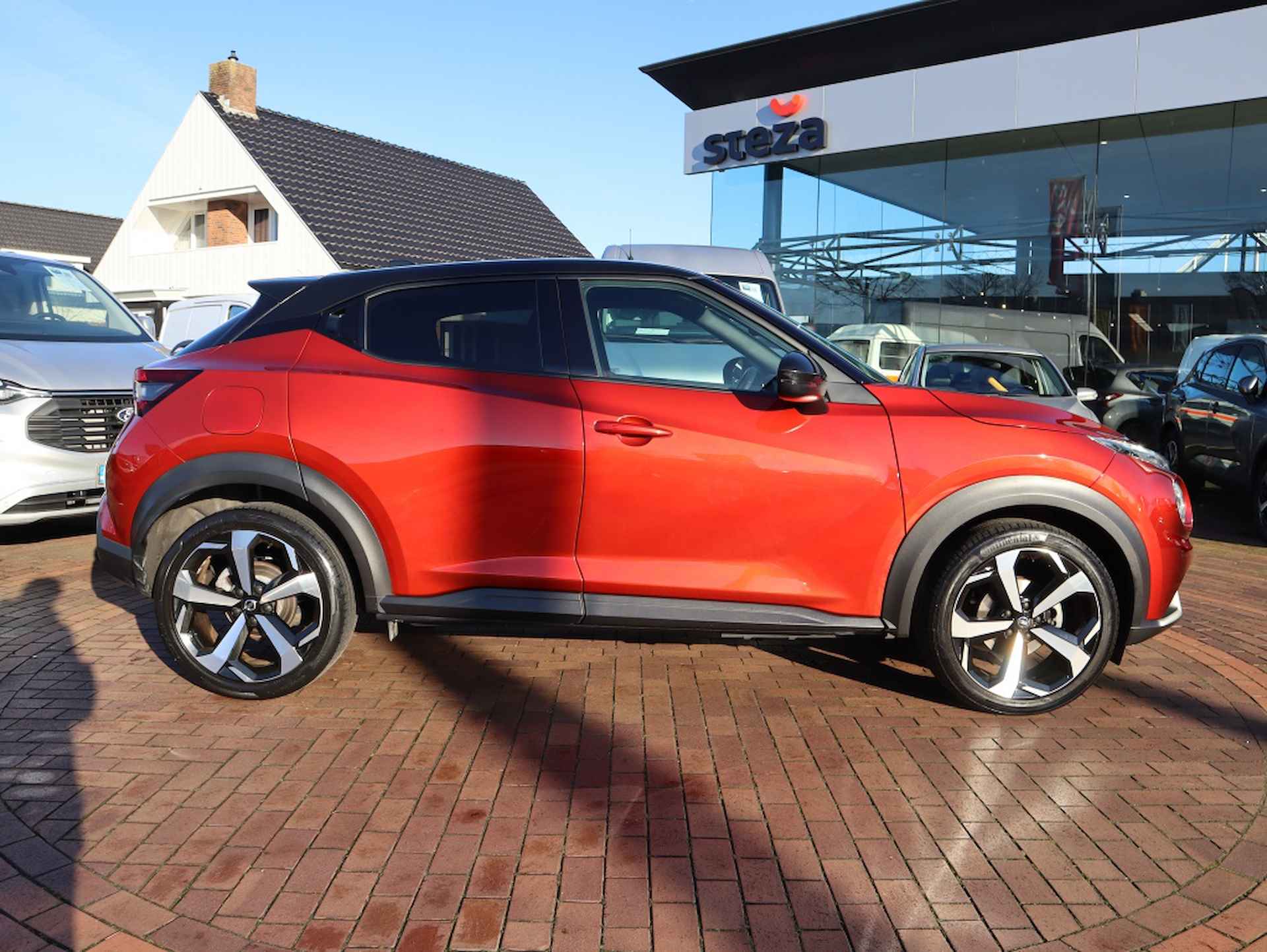 Nissan Juke 1.0 DIG-T Premiere Edition / Navigatie / Camera / Stoelverwarmin - 12/32