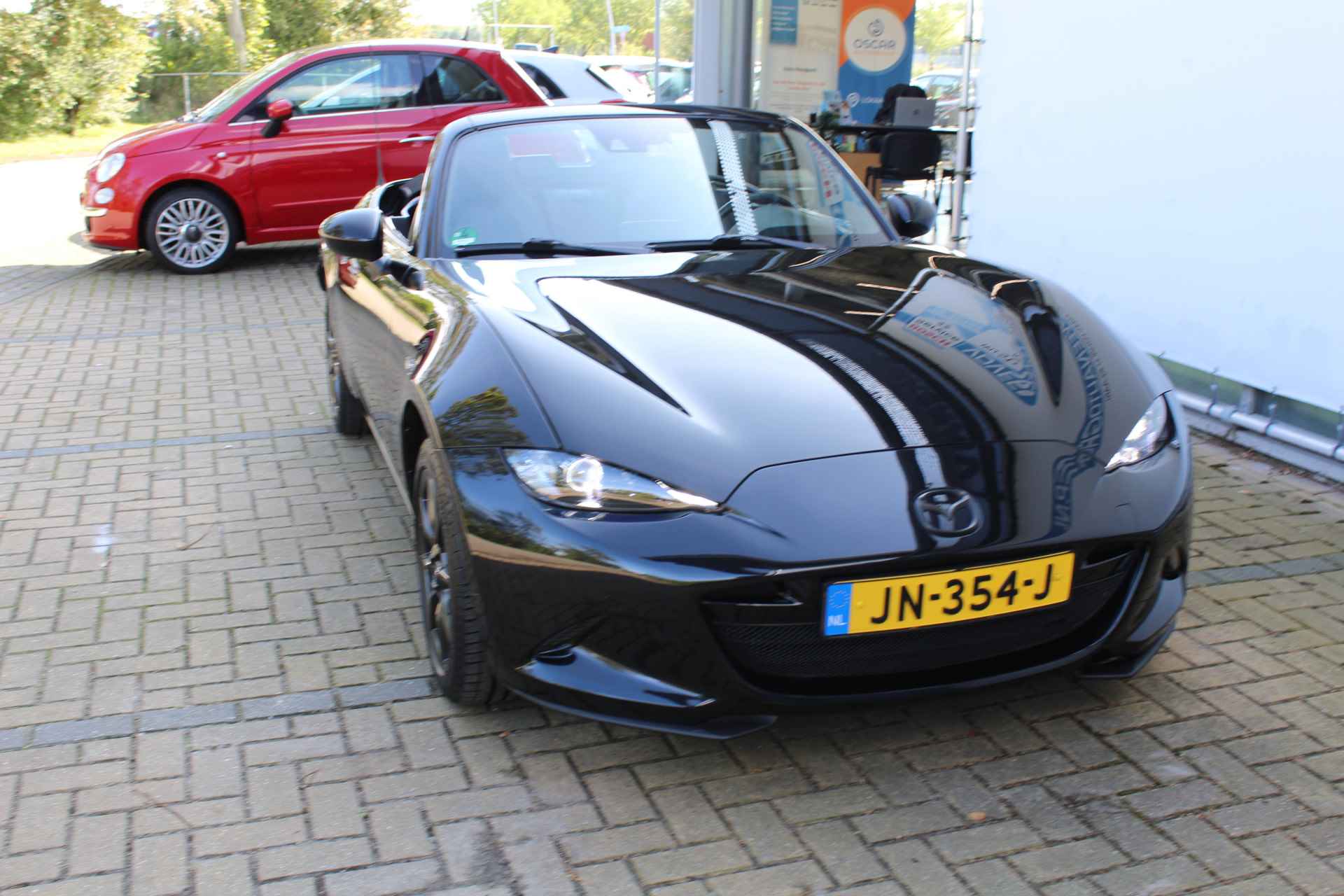 Mazda MX-5 1.5 SkyActiv-G 131 GT-M | Incl. 1 jaar Garantie | 2e Eigenaar | Stoelverwarming | Keyless entry/start | BOSE Audiosysteem | Cruise controle | Navigatie | Airco | Lane assist | Apple CarPlay/Android auto | Lederen bekleding | 16 Inch LMV | Origineel NL auto | NAP | - 21/57