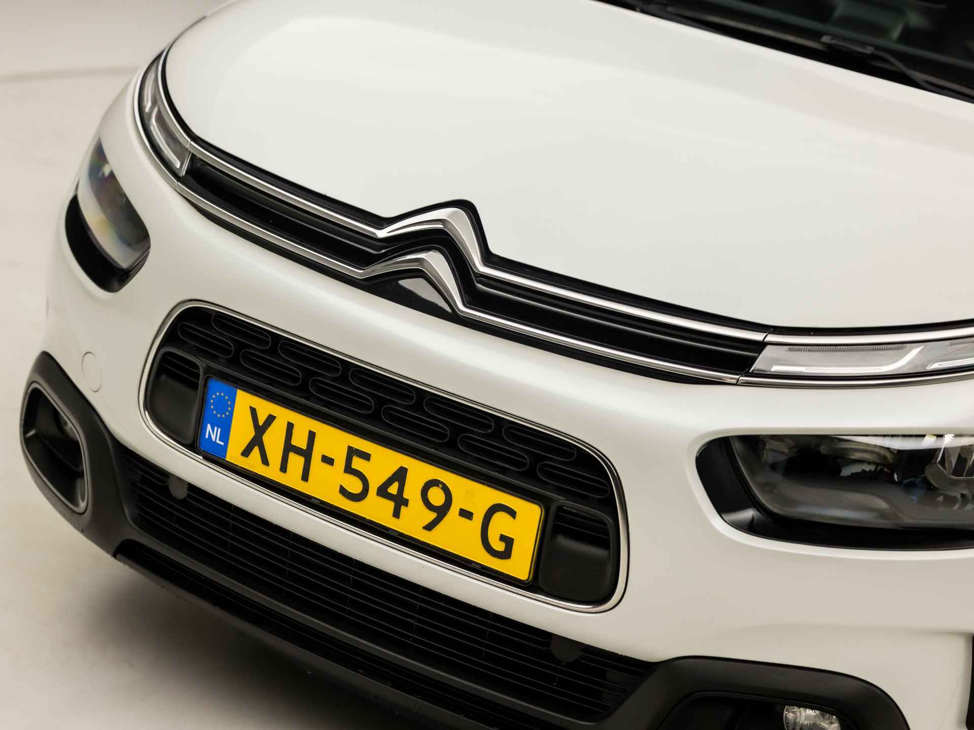 Citroën C4 Cactus 1.2 PureTech Sport (APPLE CARPLAY, NAVIGATIE, DIGITAL COCKPIT, GETINT GLAS, SPORTSTOELEN, LM VELGEN, LANE ASSIST, CRUISE, DAB+, NIEUWSTAAT) - 32/36