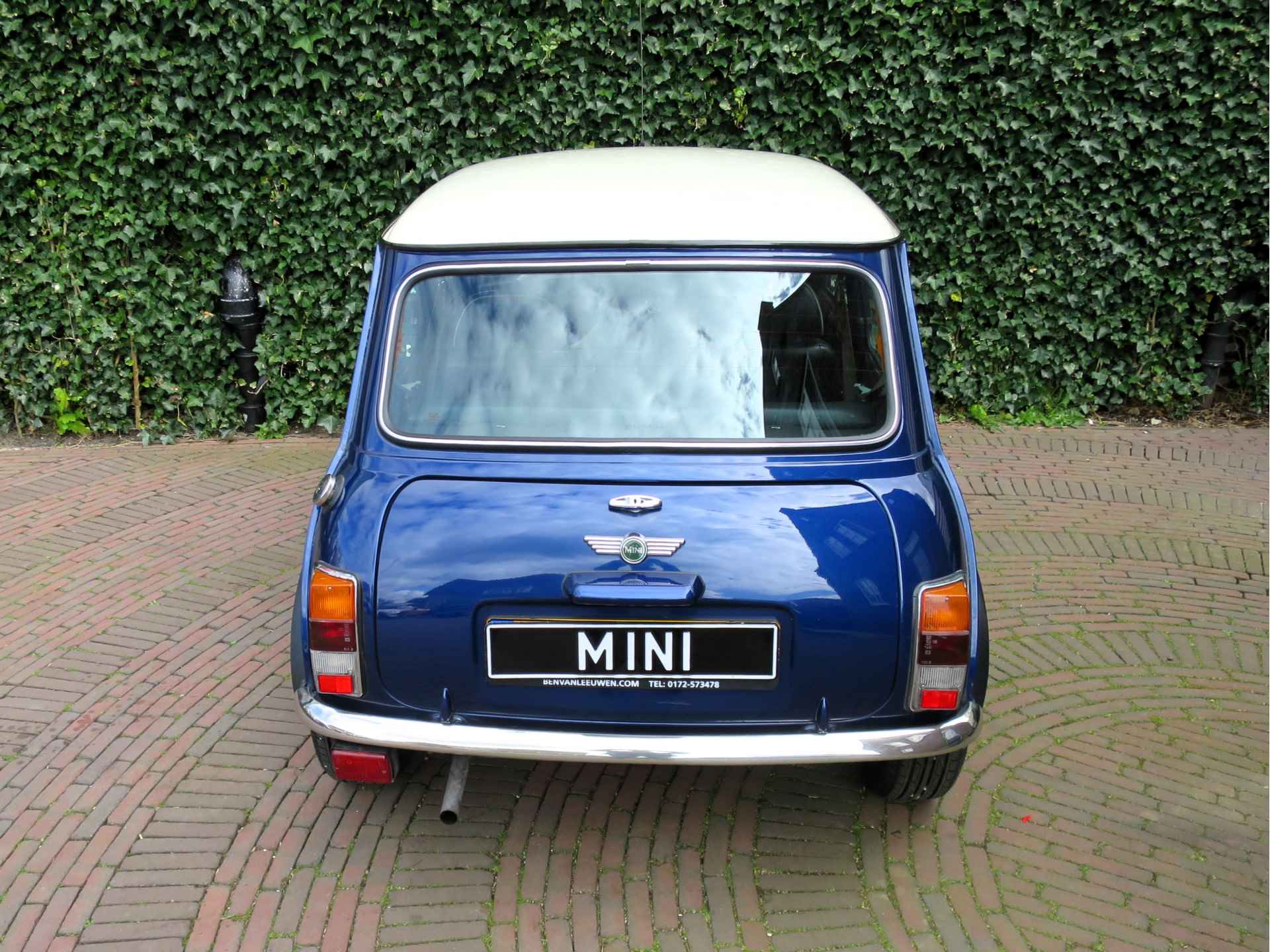 MINI Cooper 1.3 MPI NL-auto, met half leder int., houten dash en 12" - 7/35