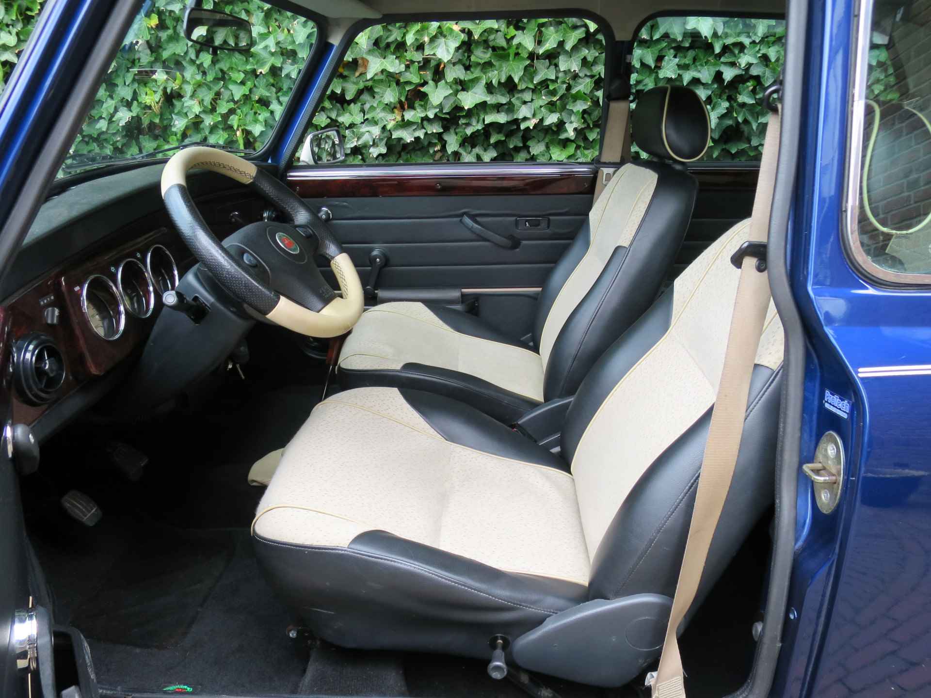 MINI Cooper 1.3 MPI NL-auto, met half leder int., houten dash en 12" - 10/35