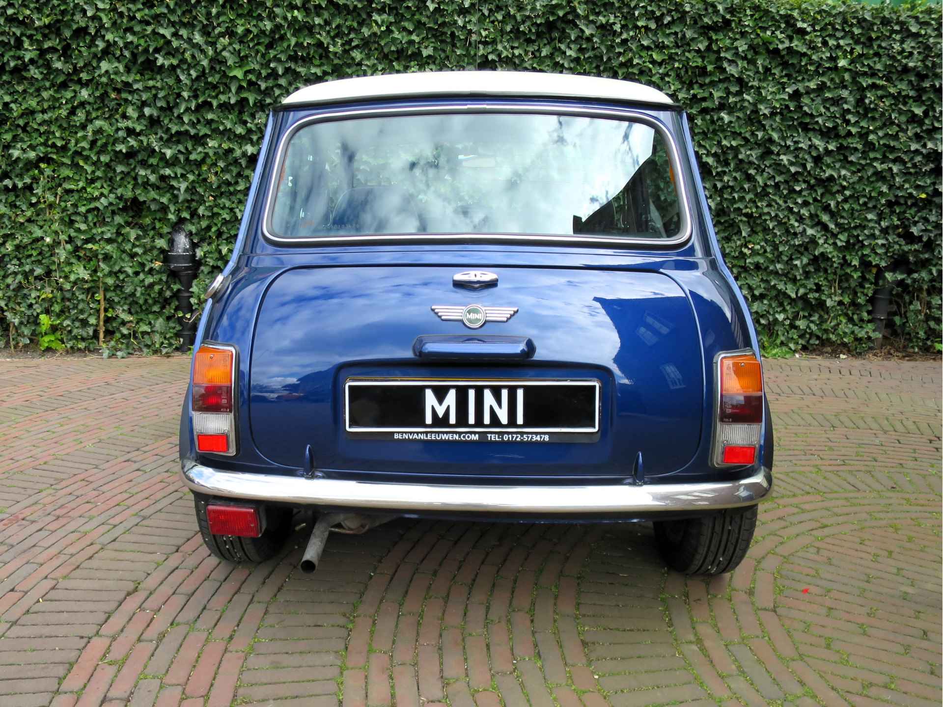 MINI Cooper 1.3 MPI NL-auto, met half leder int., houten dash en 12" - 28/35