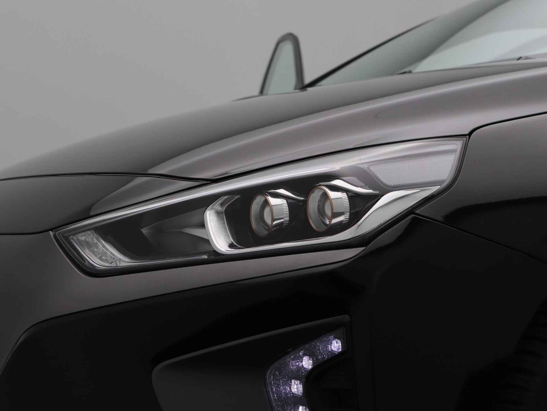 Hyundai IONIQ Premium EV | SEPP subsidie mogelijk | Airco | Cruise Control | Lederen bekleding | Navigatie | LED | - 18/63