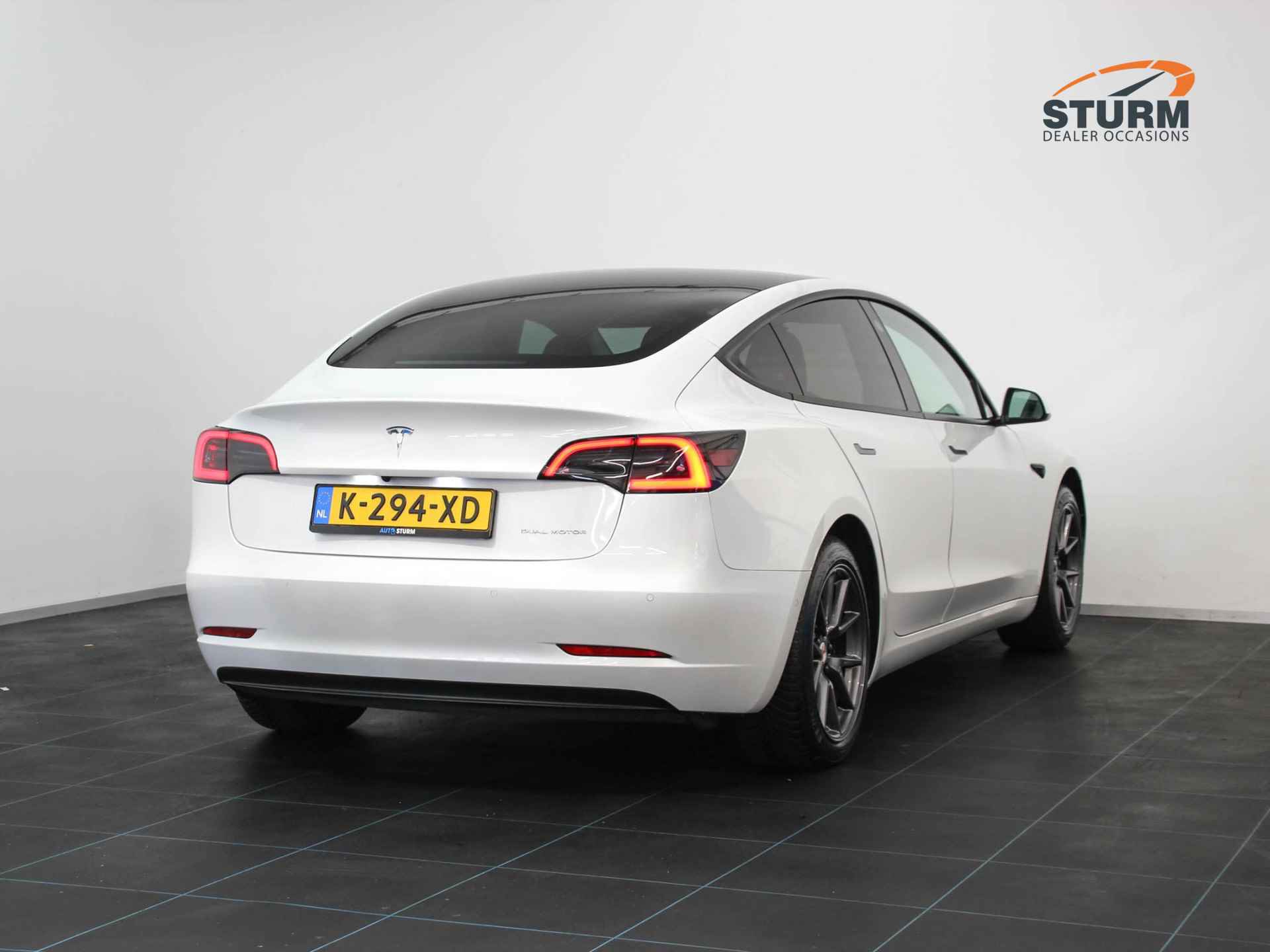 Tesla Model 3 Long Range 75 kWh | Dual Motor | Panoramadak | Vol-Leder Wit | Stoelverwarming | Dashcam | Adapt. Cruise Control | Parelmoer Kleur | Rijklaarprijs! - 4/29