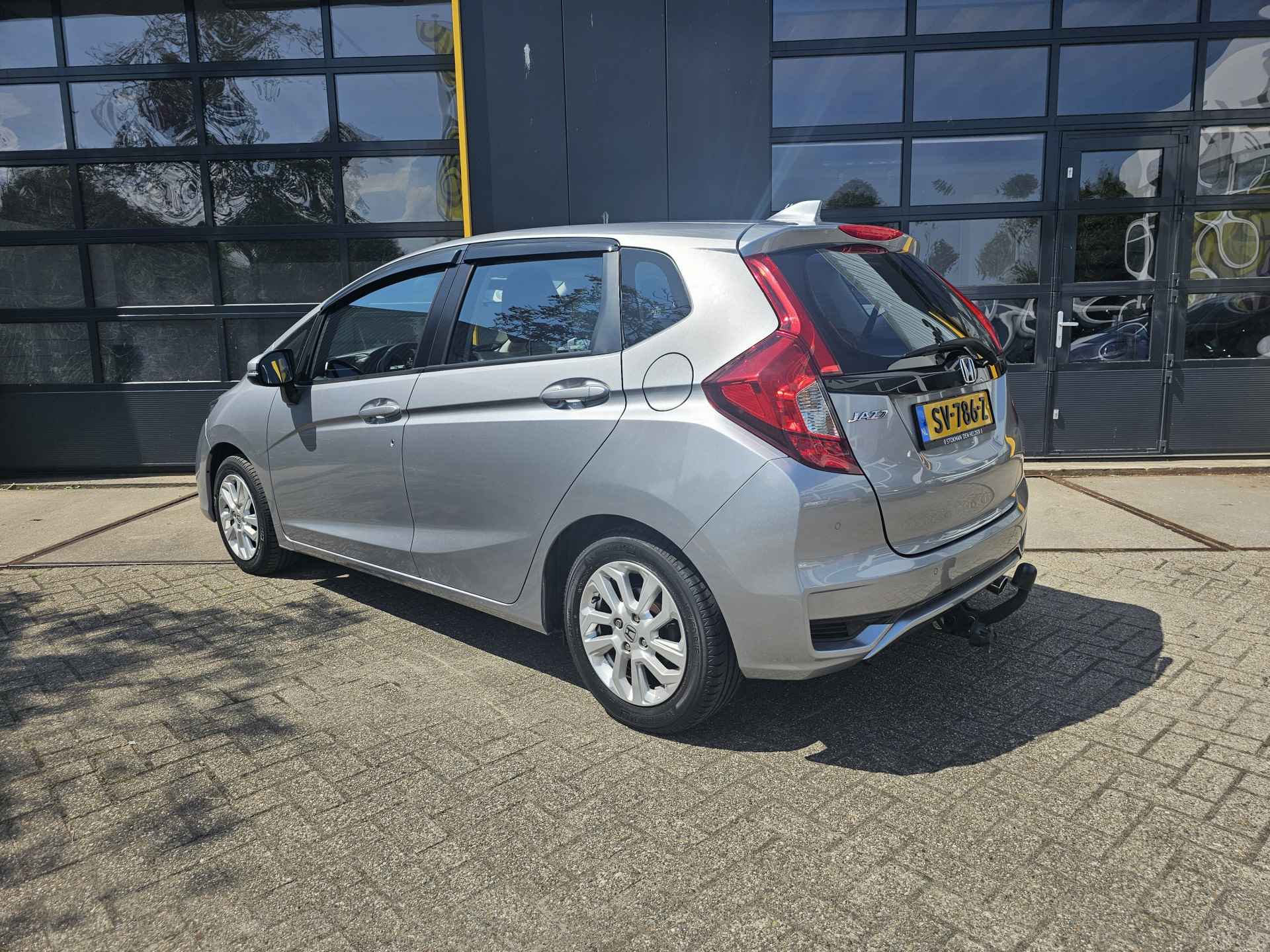 Honda Jazz 1.3 i-VTEC 102pk AUT Comfort | Navigatie | Lm velgen | Climat Control | Cruise | Trekhaak | incl. Bovag rijklaarpakket met 12 maanden garantie | - 4/40