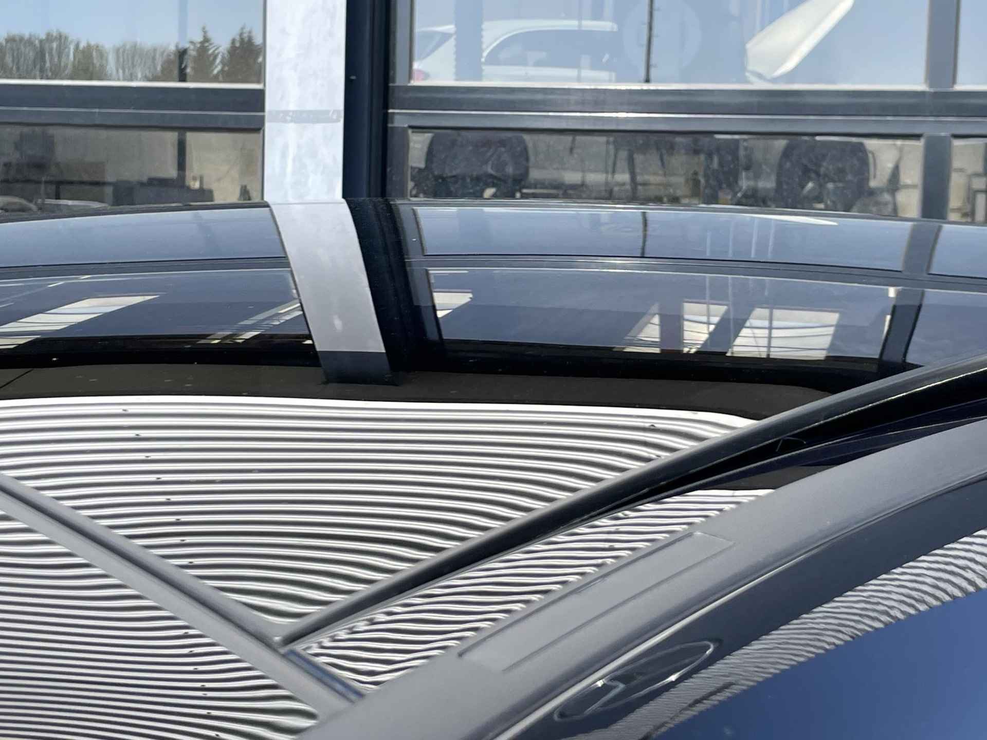 Mercedes-Benz B-klasse 250 e AMG Line | Nightpakket | Panoramadak | Achteruitrijcamera | Stoelverwarming | Dodehoekassistent | Sfeerverlichting | Trekhaak | Apple & Android Carplay - 9/32