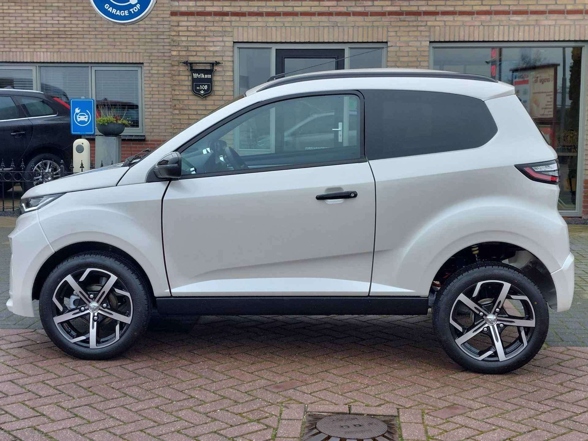 Aixam e-Crossover Premium | Nieuw op voorraad | Standkachel | Dealer - 8/33