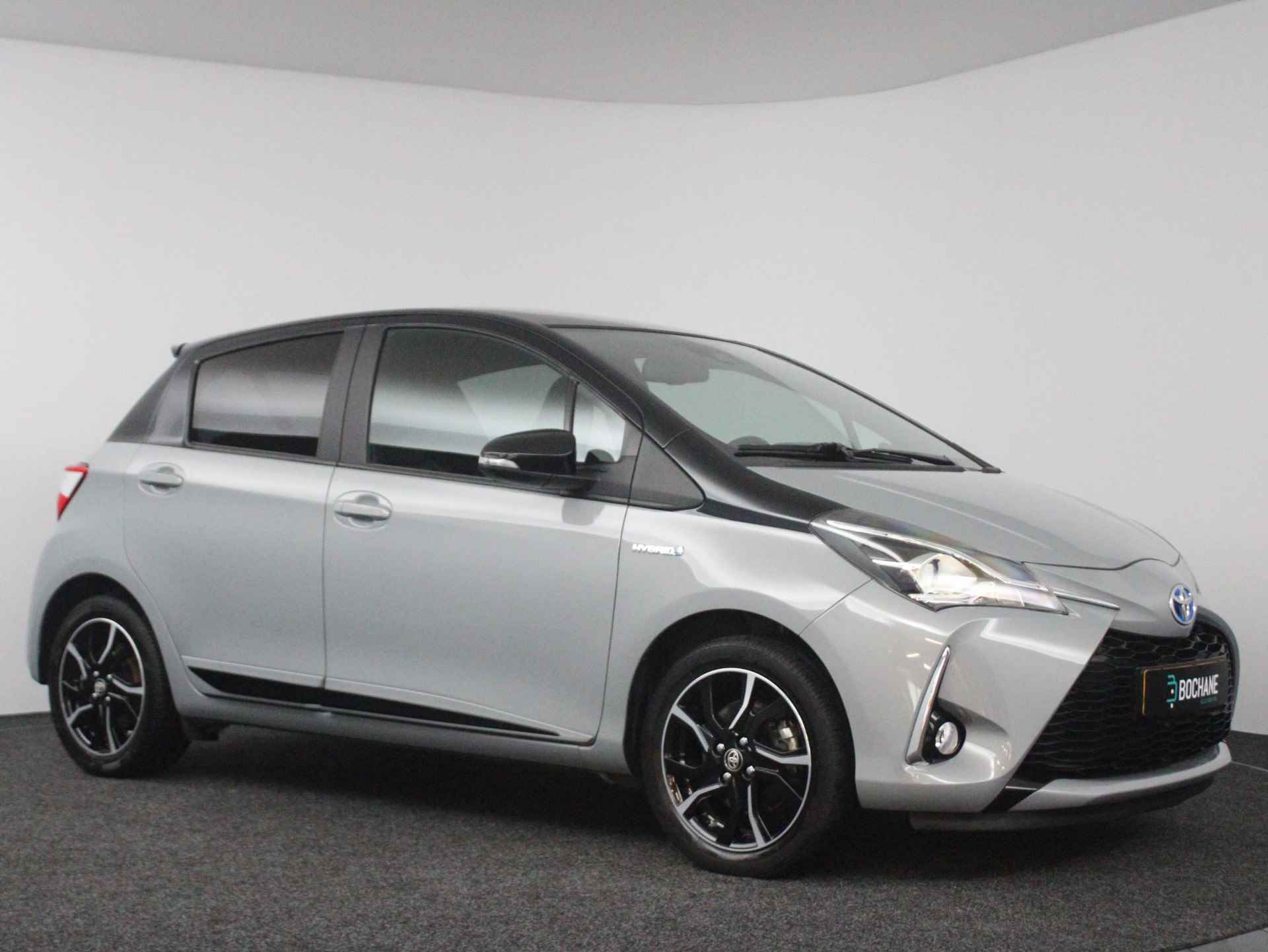 Toyota Yaris 1.5 Hybrid Bi-Tone Plus  | Navi | Clima | Panoramadak | Achteruitrijcamera | LMV | Cruise | Bluetooth | - 27/47