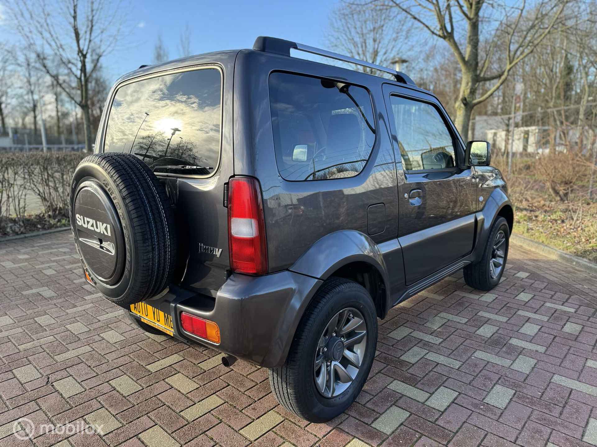 Suzuki Jimny 1.3 Exclusive - 23/28