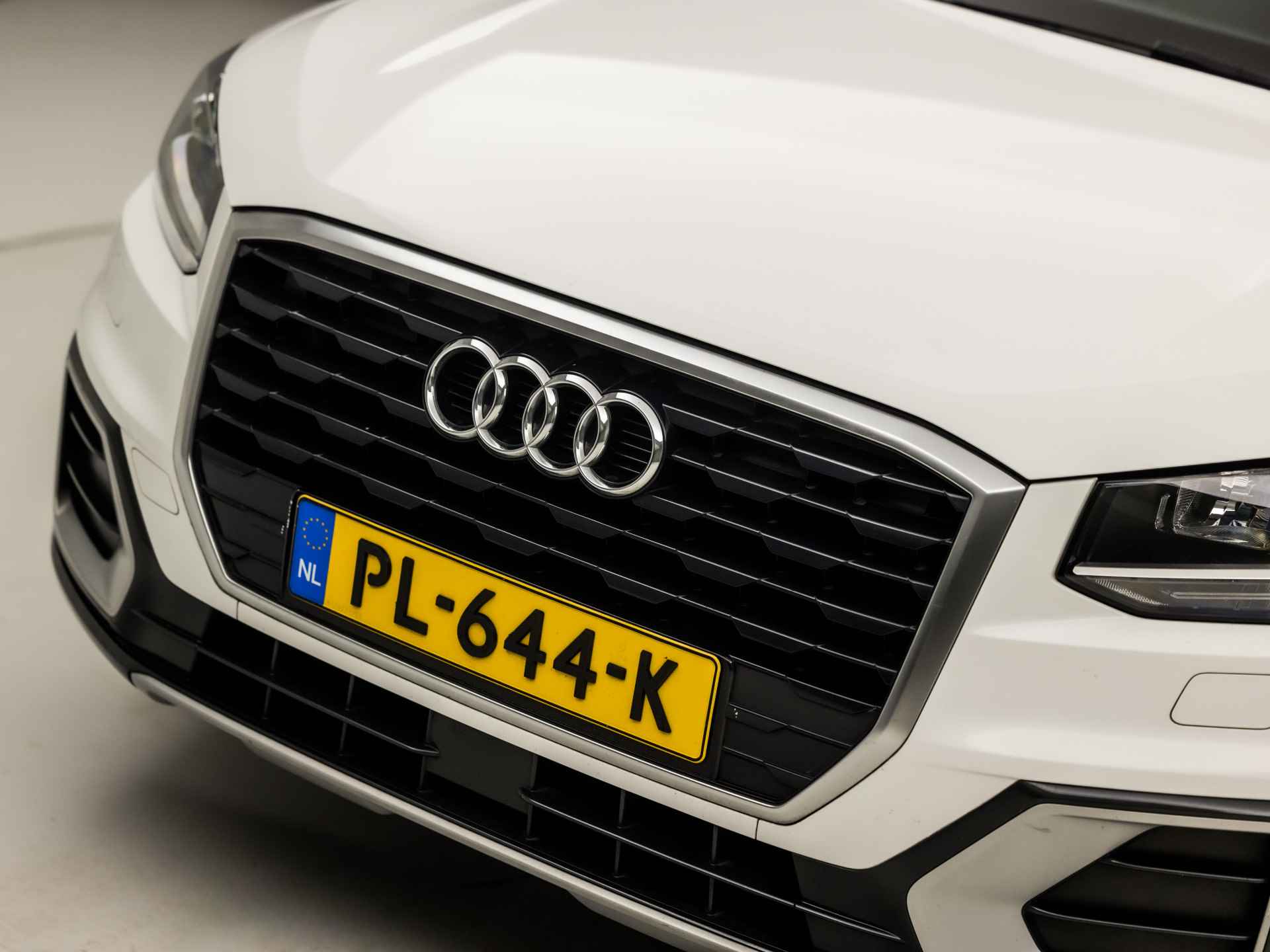 Audi Q2 1.0 TFSI Sport (GROOT NAVI, STOELVERWARMING, PLAT SPORTSTUUR, GETINT GLAS, SPORTSTOELEN, CRUISE, ARMSTEUN, NIEUWE APK, NIEUWSTAAT) - 32/36